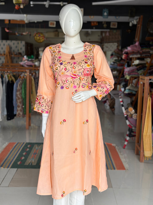 Peach hand embroidered birds and flowers design a-line net kurti with cotton lining