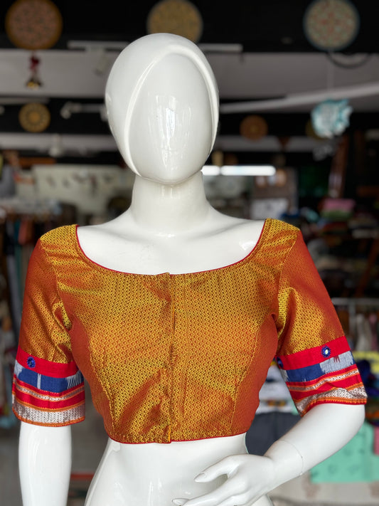 Orange Khun blouse with mirror work