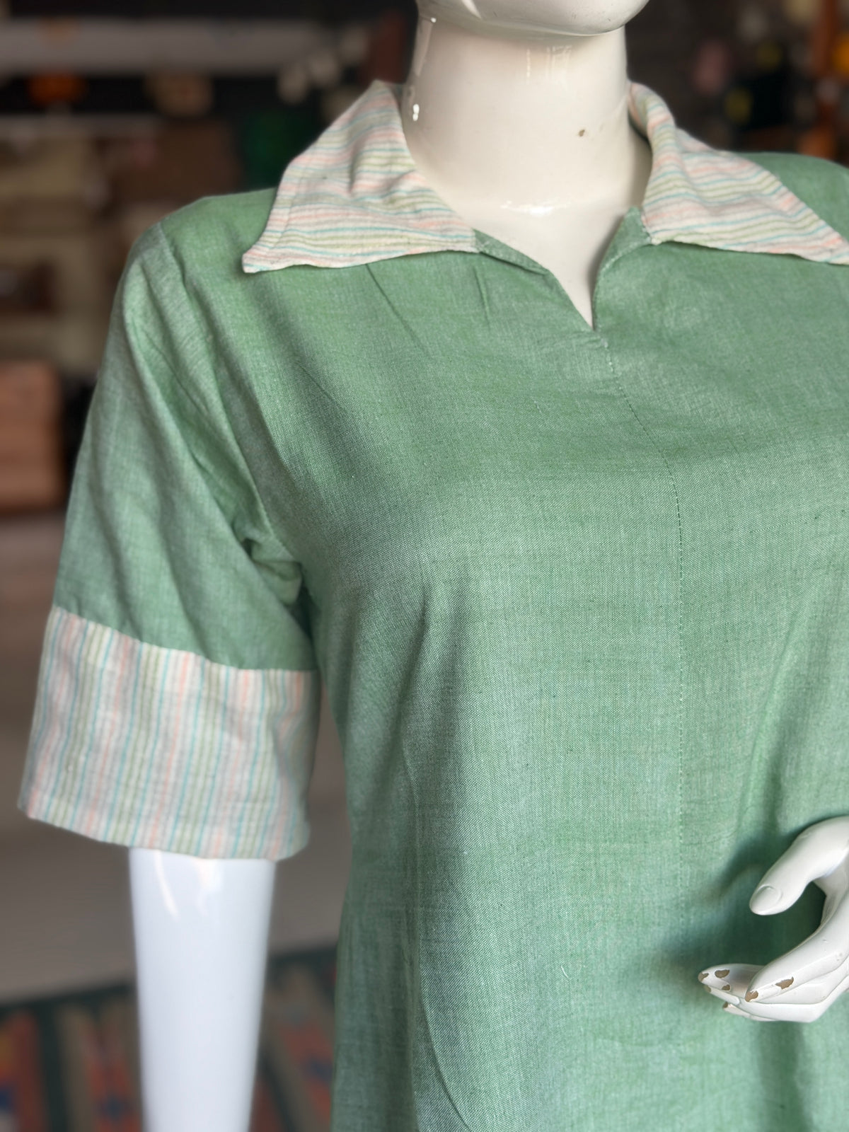 Sage green handloom cotton dress with hand spun, hand woven cotton stripes trims