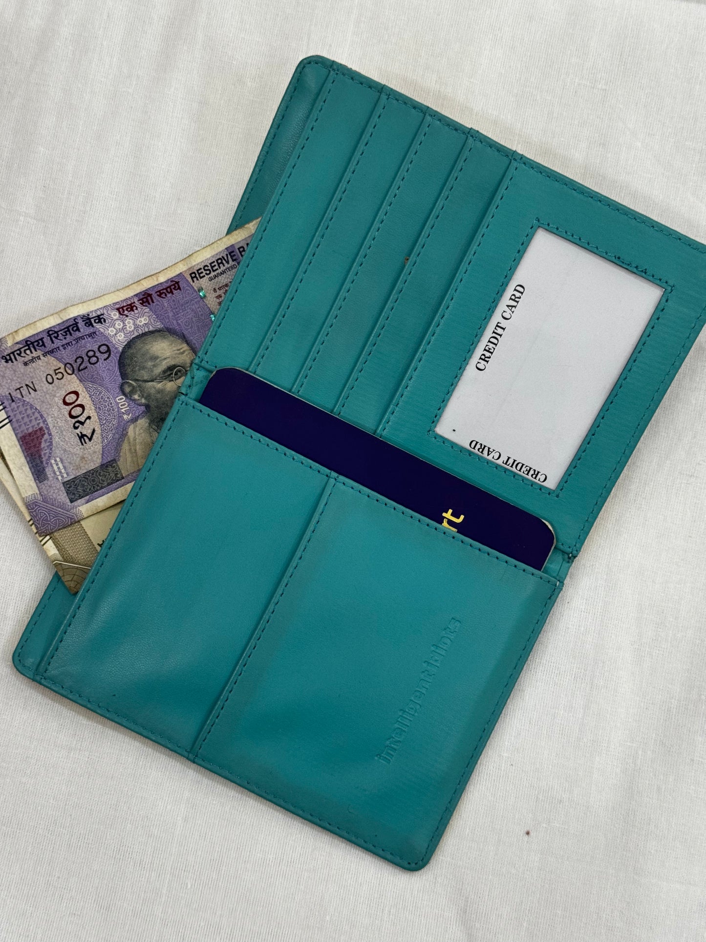 Quirky prints passport holder with slots for cards and cash