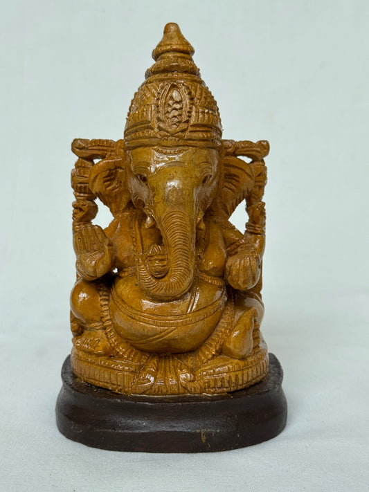 Ganesha hand carved statue in white wood