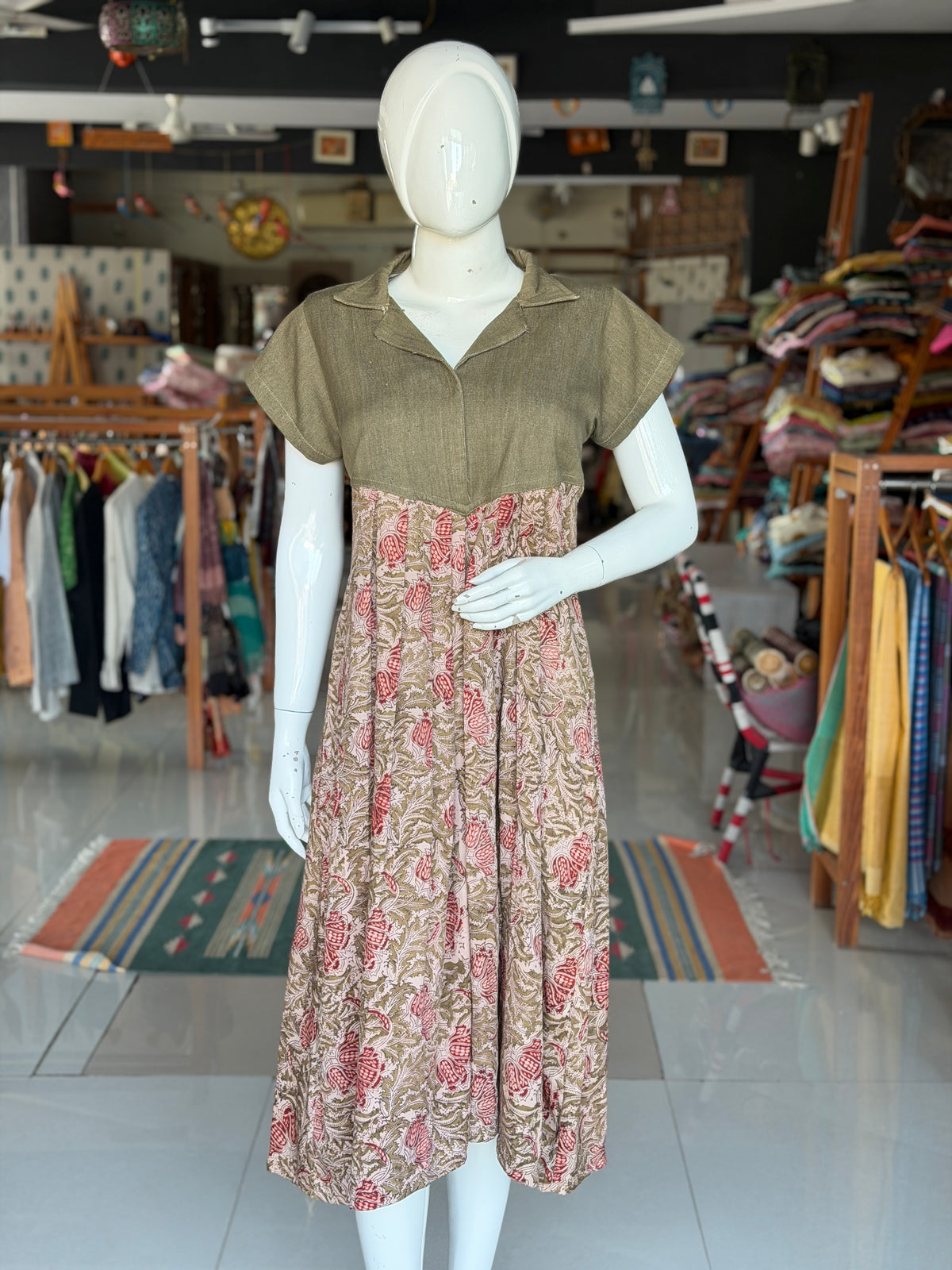 Green denim weave cotton hand woven playful shirt look dress with Kalamkari hand block prints