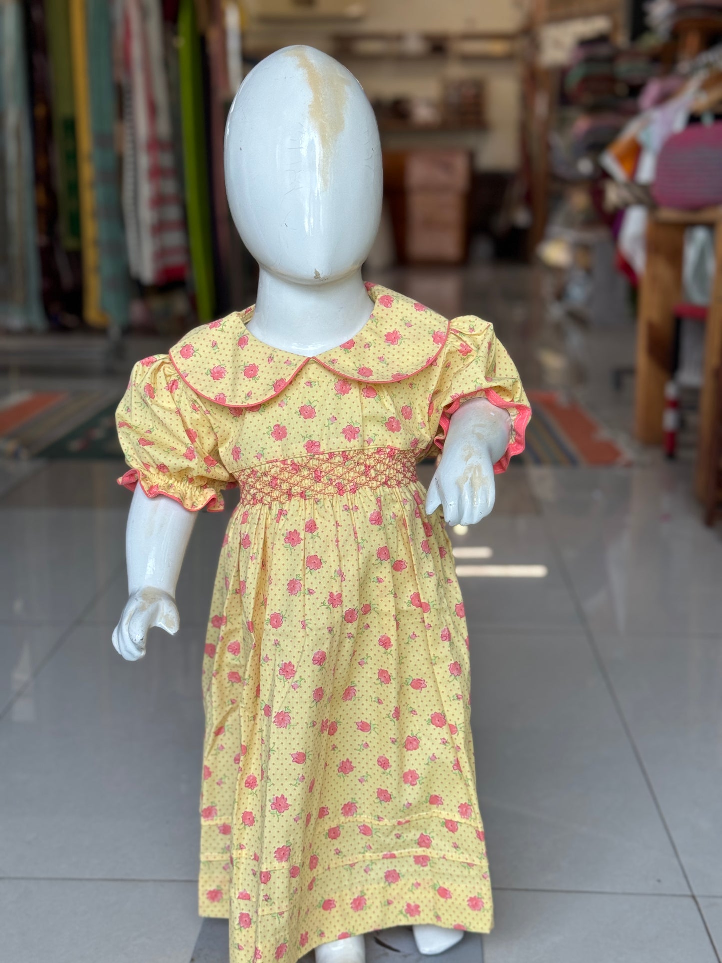 Yellow floral print hand embroidered smocking cotton frock for girls with collar