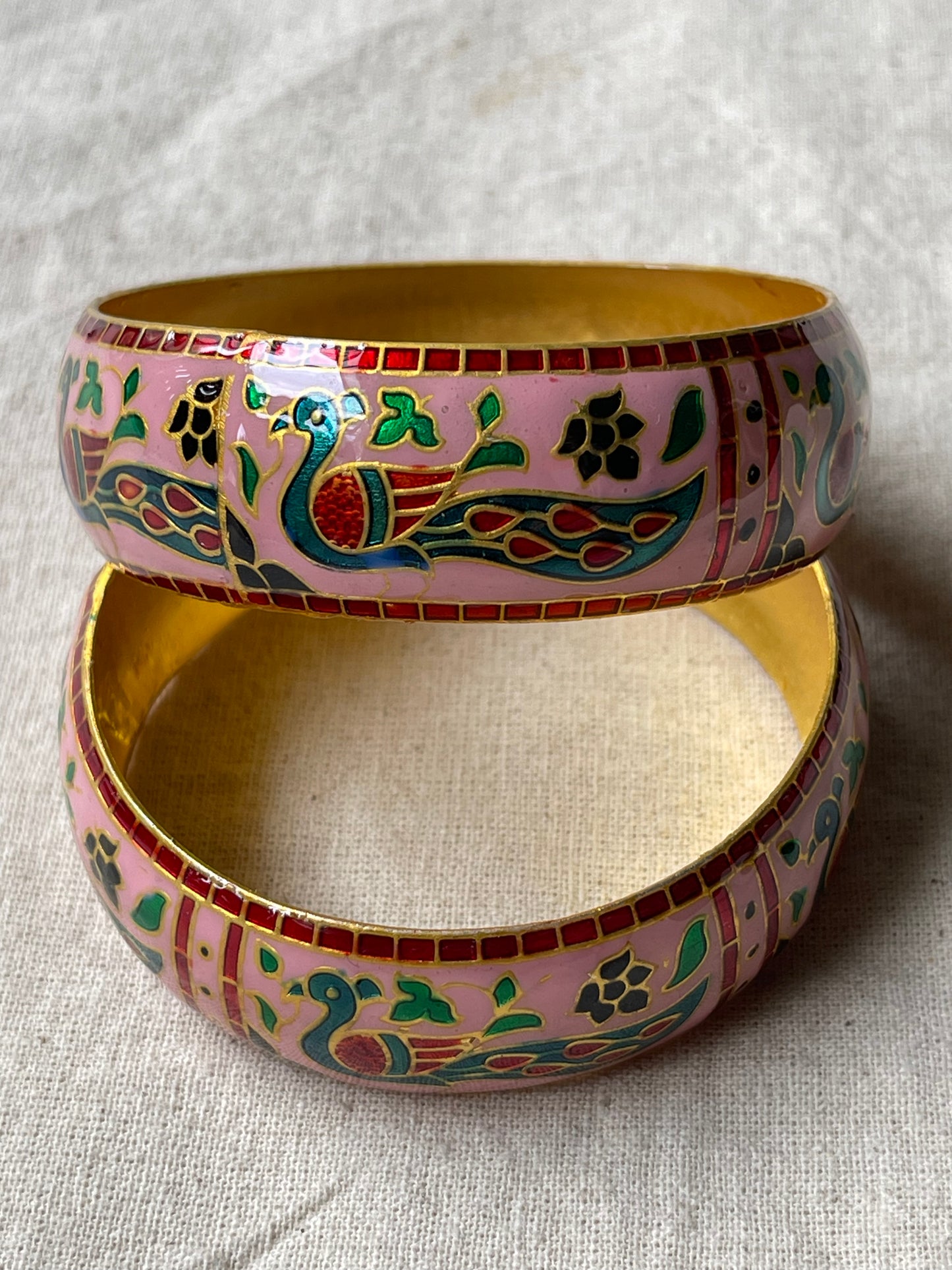 Lacquer enamel bangles pair with peacock motifs