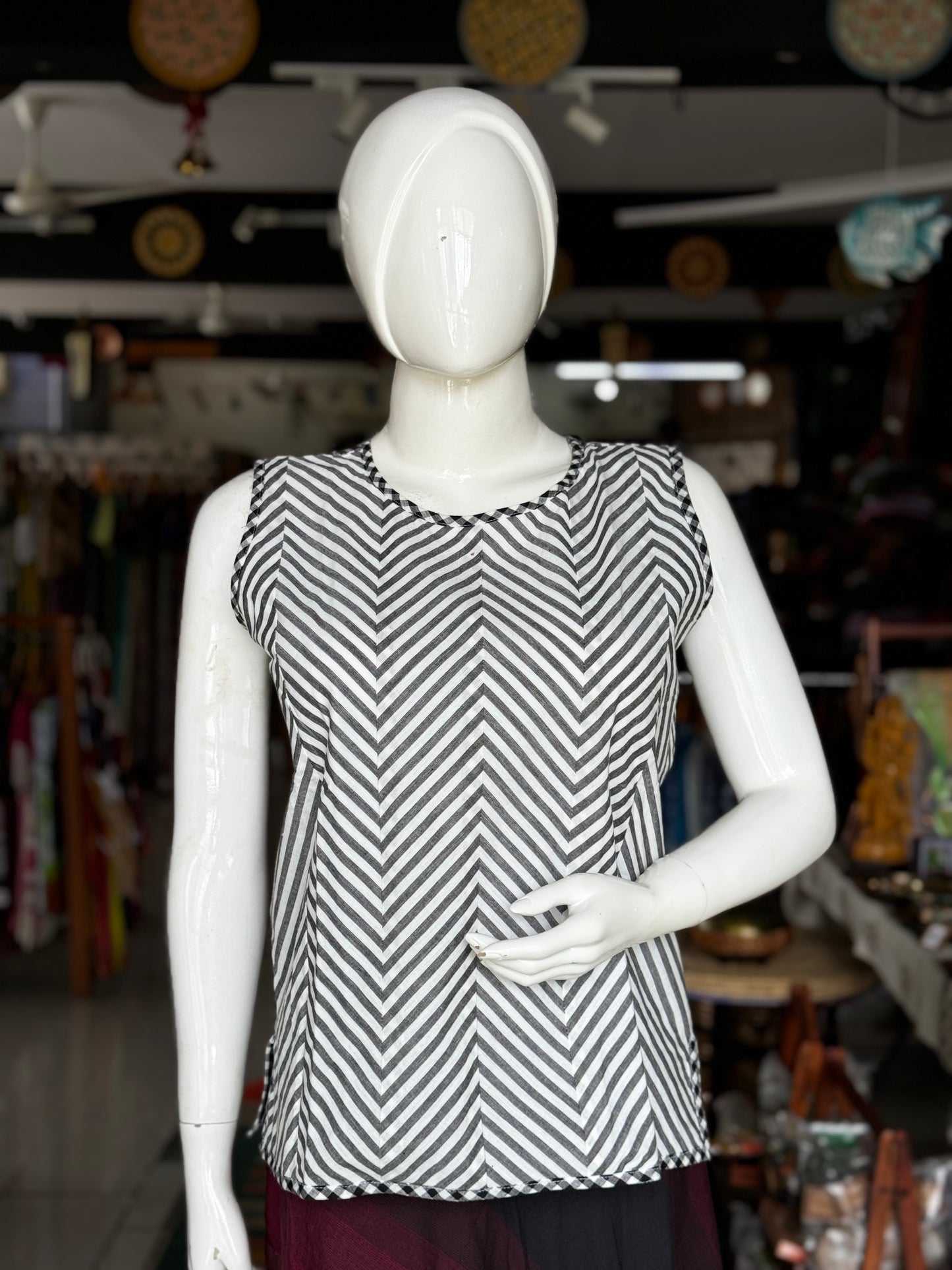 White and black cotton sleeveless top with stripes and checks pattern