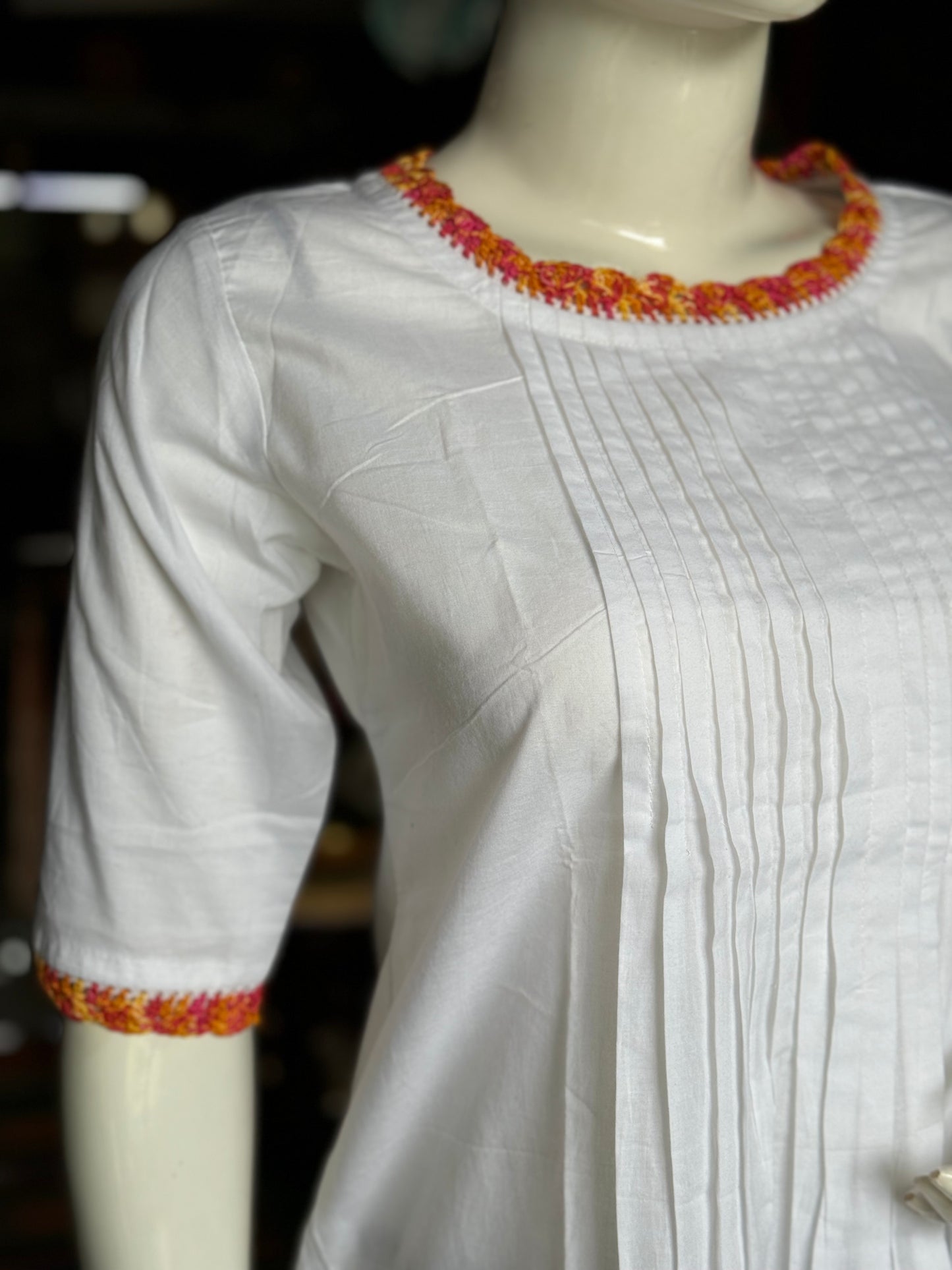 White pin-tucks cotton top with hand crocheted neck and sleeves detailing