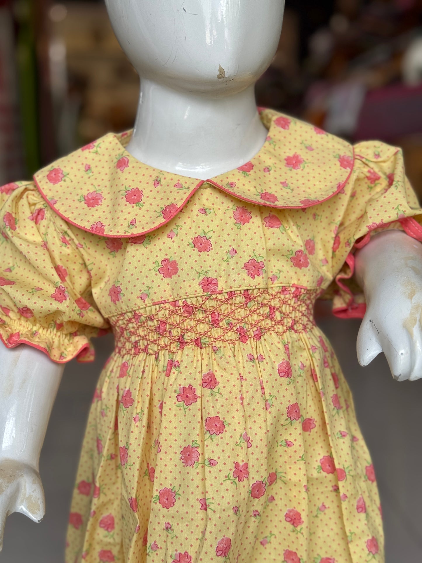 Yellow floral print hand embroidered smocking cotton frock for girls with collar
