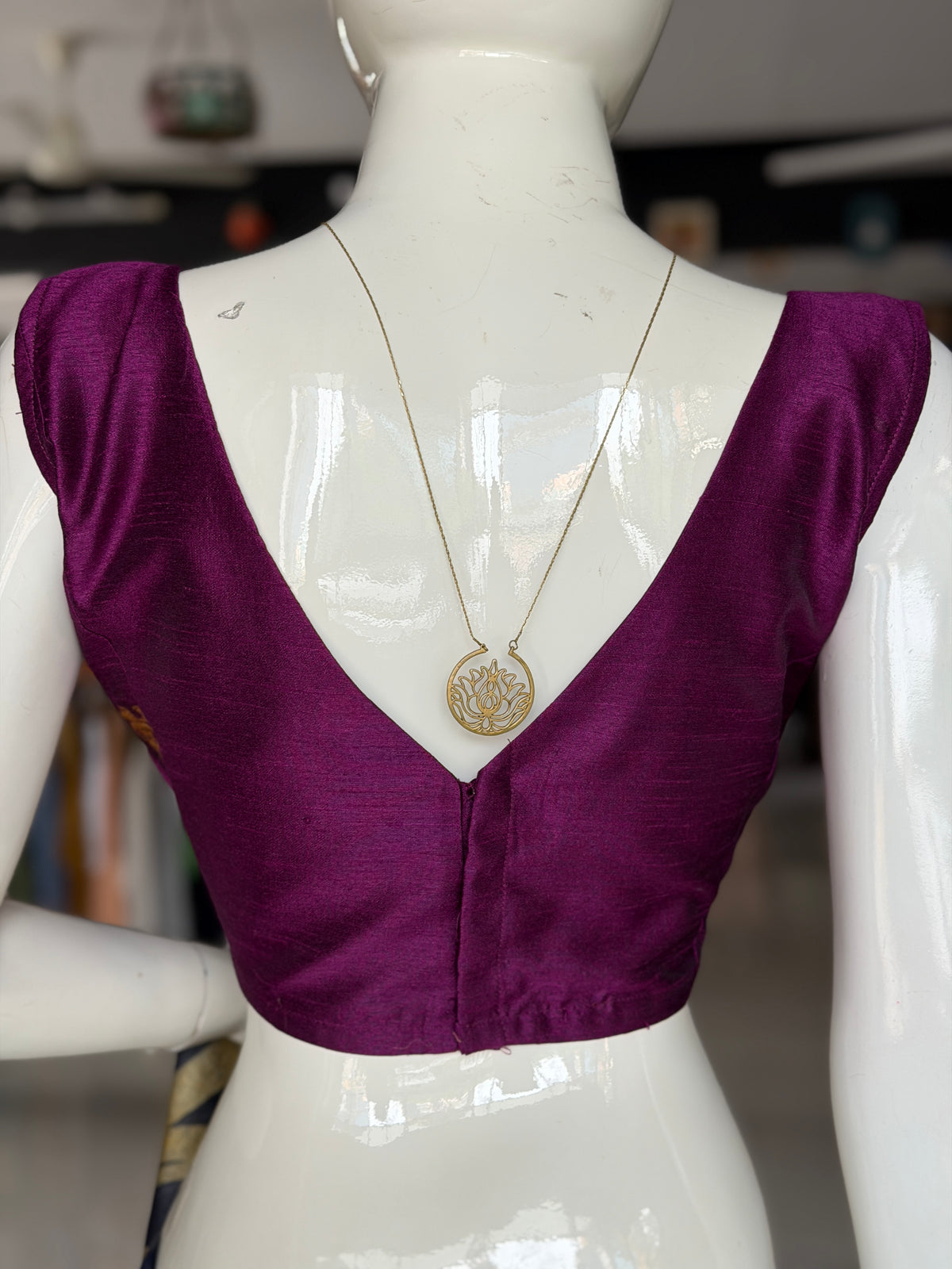 Purple handwoven raw silk sleeveless blouse with golden village motifs