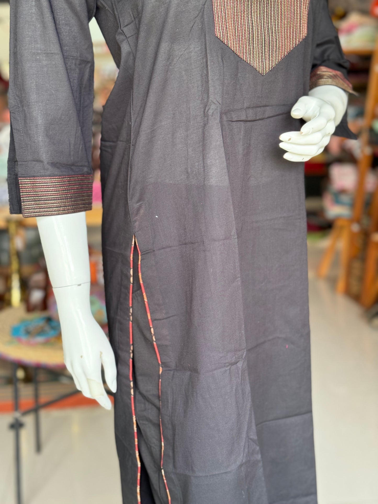 Black cotton kurti with thread work for yoke and sleeves