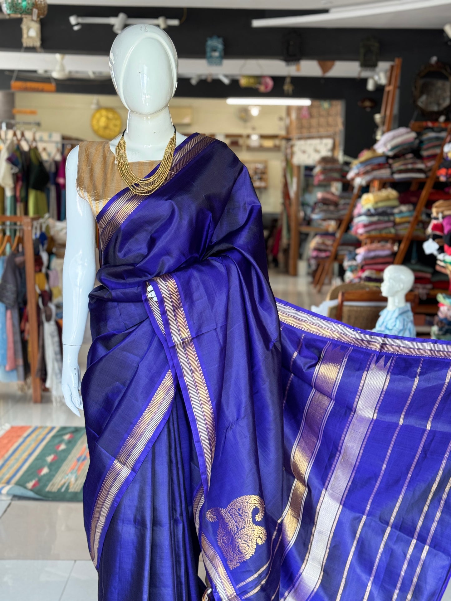 MS blue pure silk handloom Kumbakonam pattu saree with paisley corner motif and stripes border