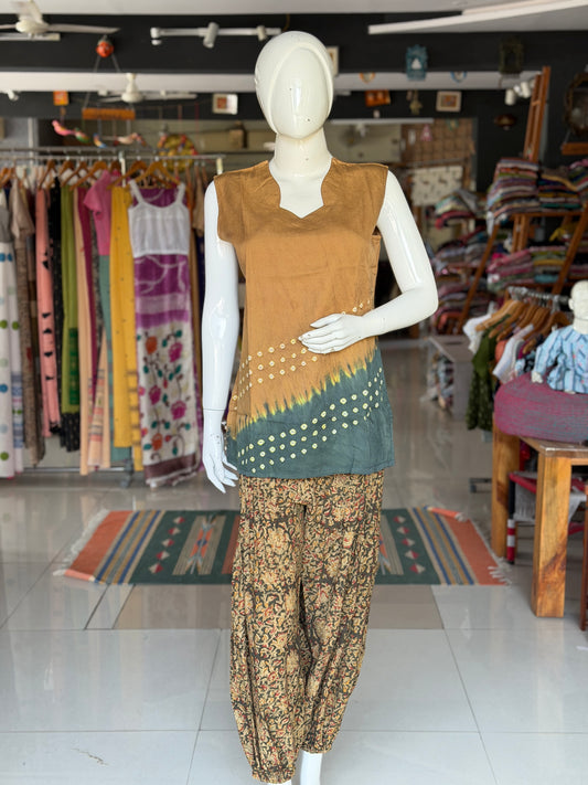 Olive green Kalamkari hand block printed cotton harem pants for women with elastic hem