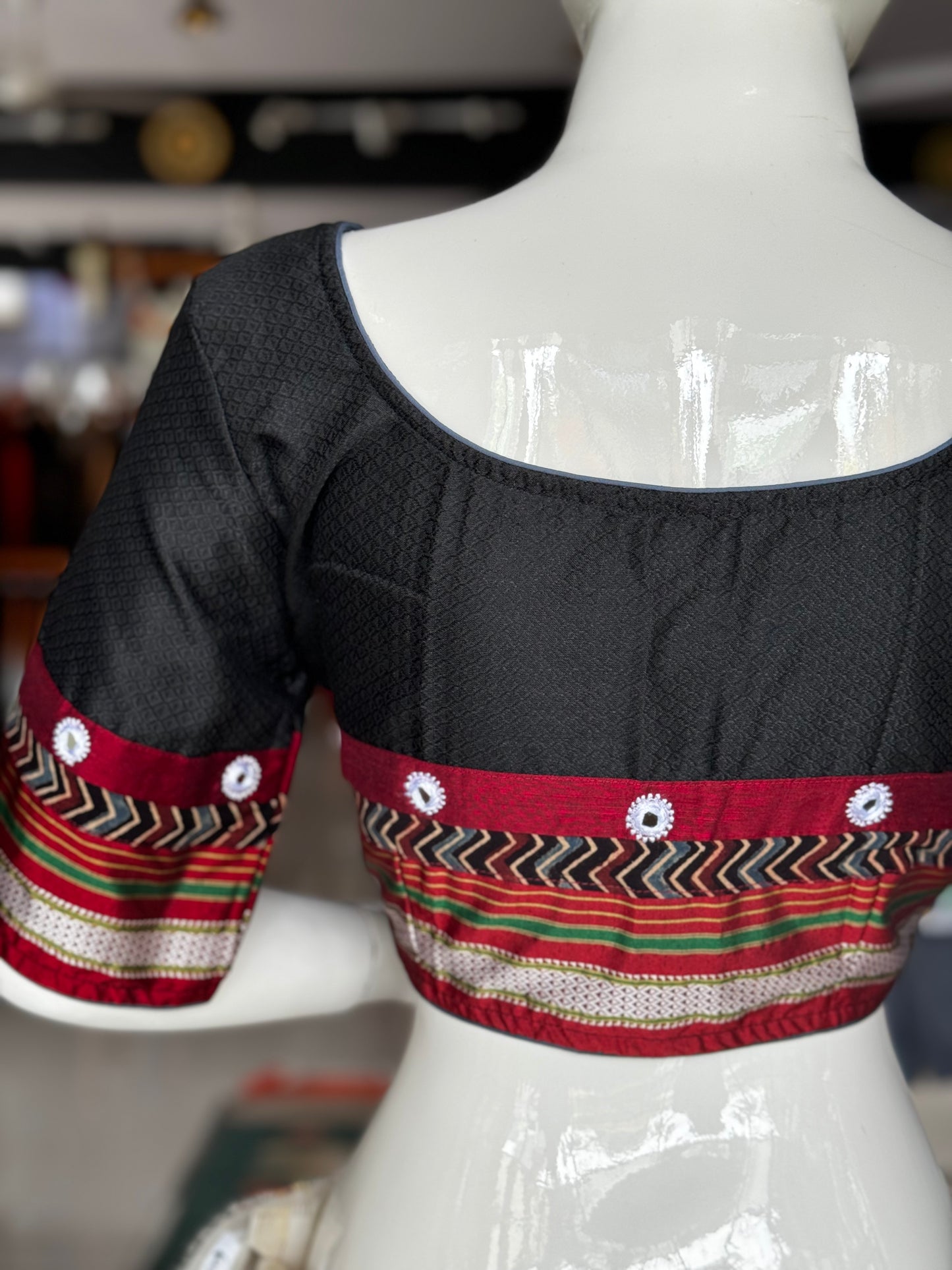 Black Khun blouse with mirror work and maroon border