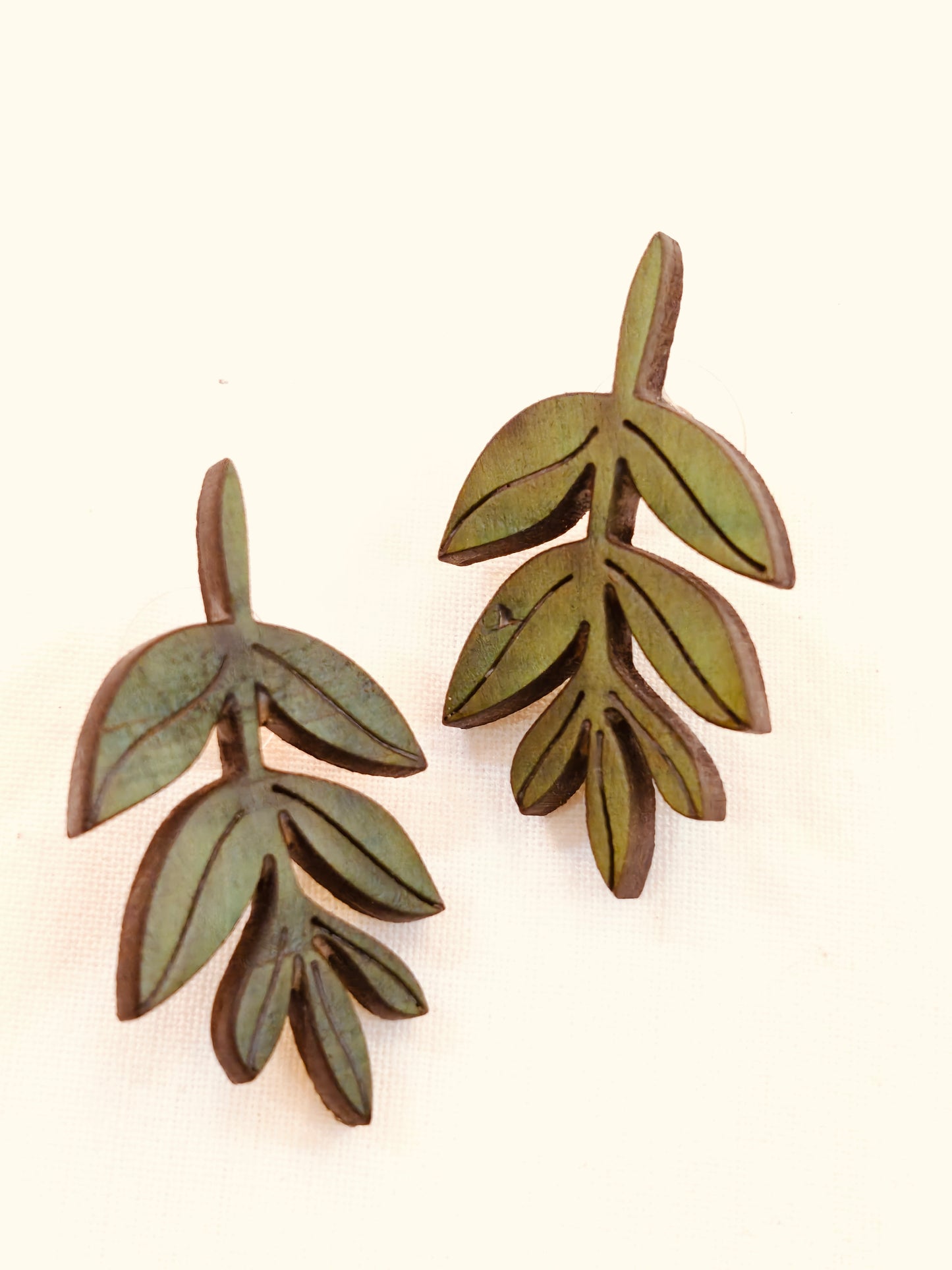 Leaf design earrings in wood