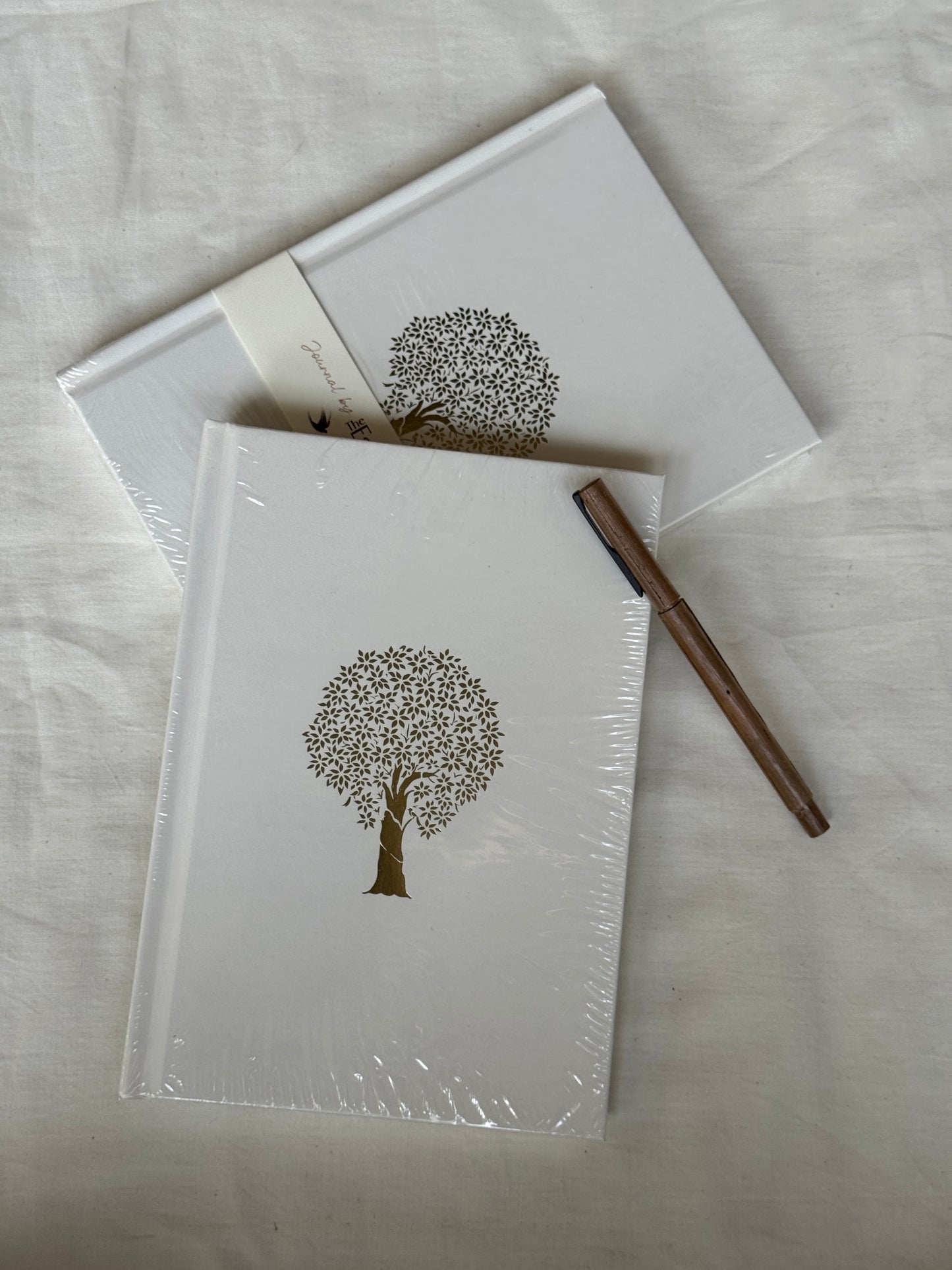 Ruled paper notebook journal / diary with gold foiled cover and  handwoven pouch