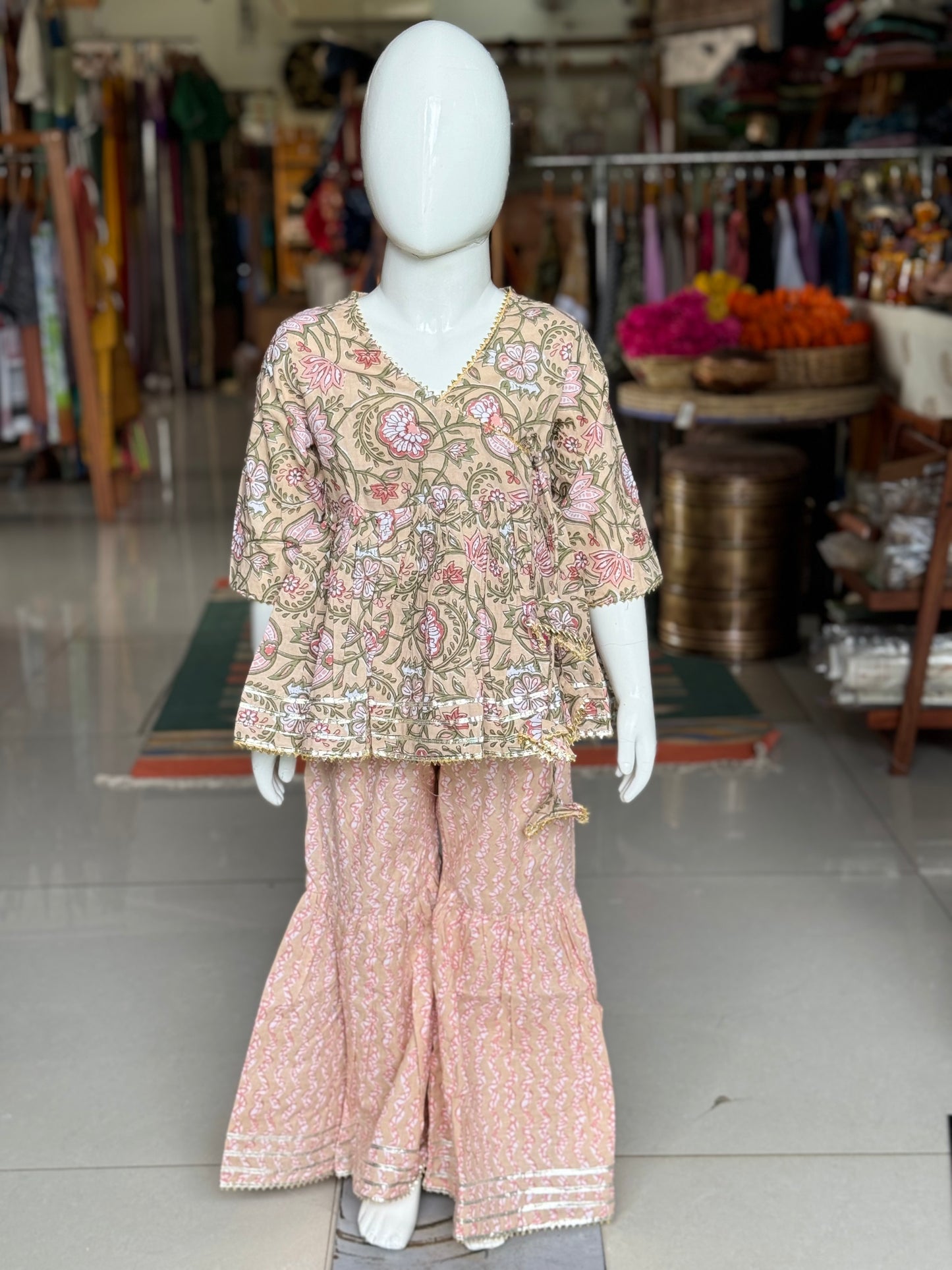 Angrakha style floral cotton short kurta and sharara pants set for girls with gota detailing