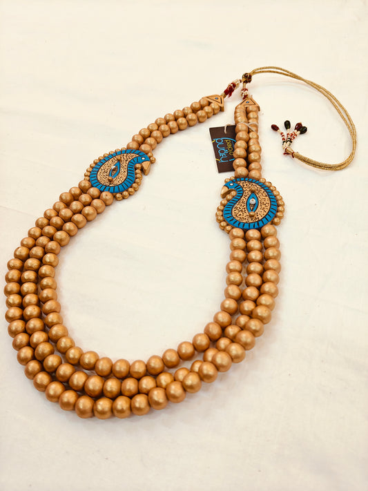 Golden terracotta beads in 3 layers with blue paisley motif neckpiece, jhumki earrings set