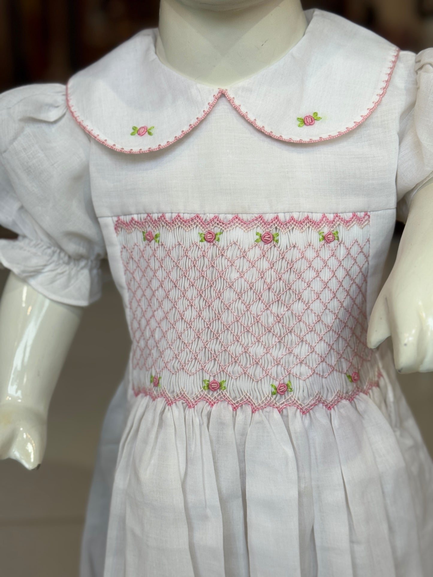 White smocking collared cotton frock with hand embroidery and waist tie