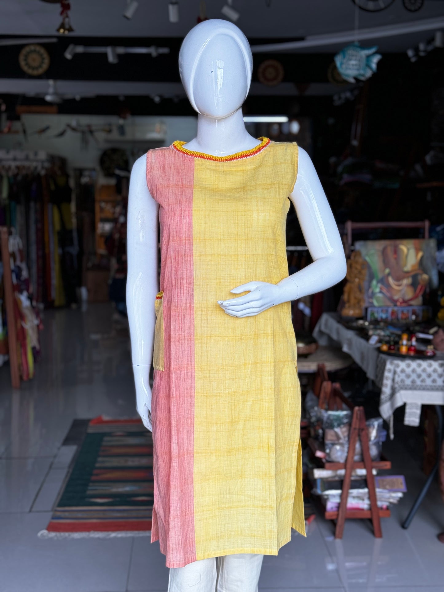 Peach yellow color block hand crocheted pocket details sleeveless cotton kurta