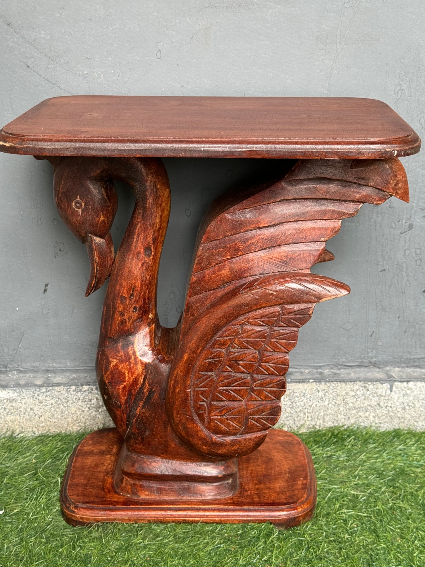 Wooden side / center table with carved swan base and flat top