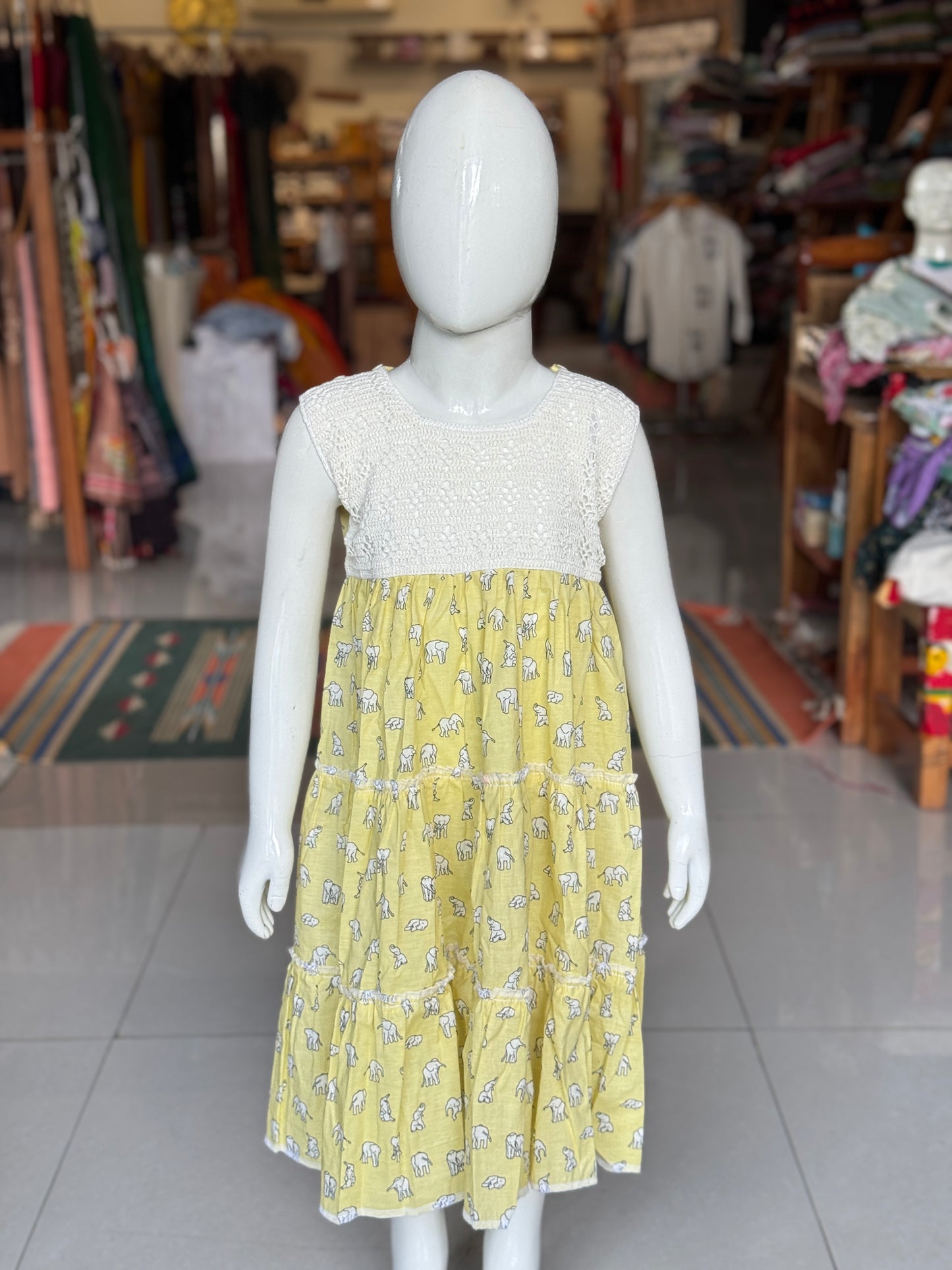 Tiered hand block printed cotton frock with crochet yoke for girls