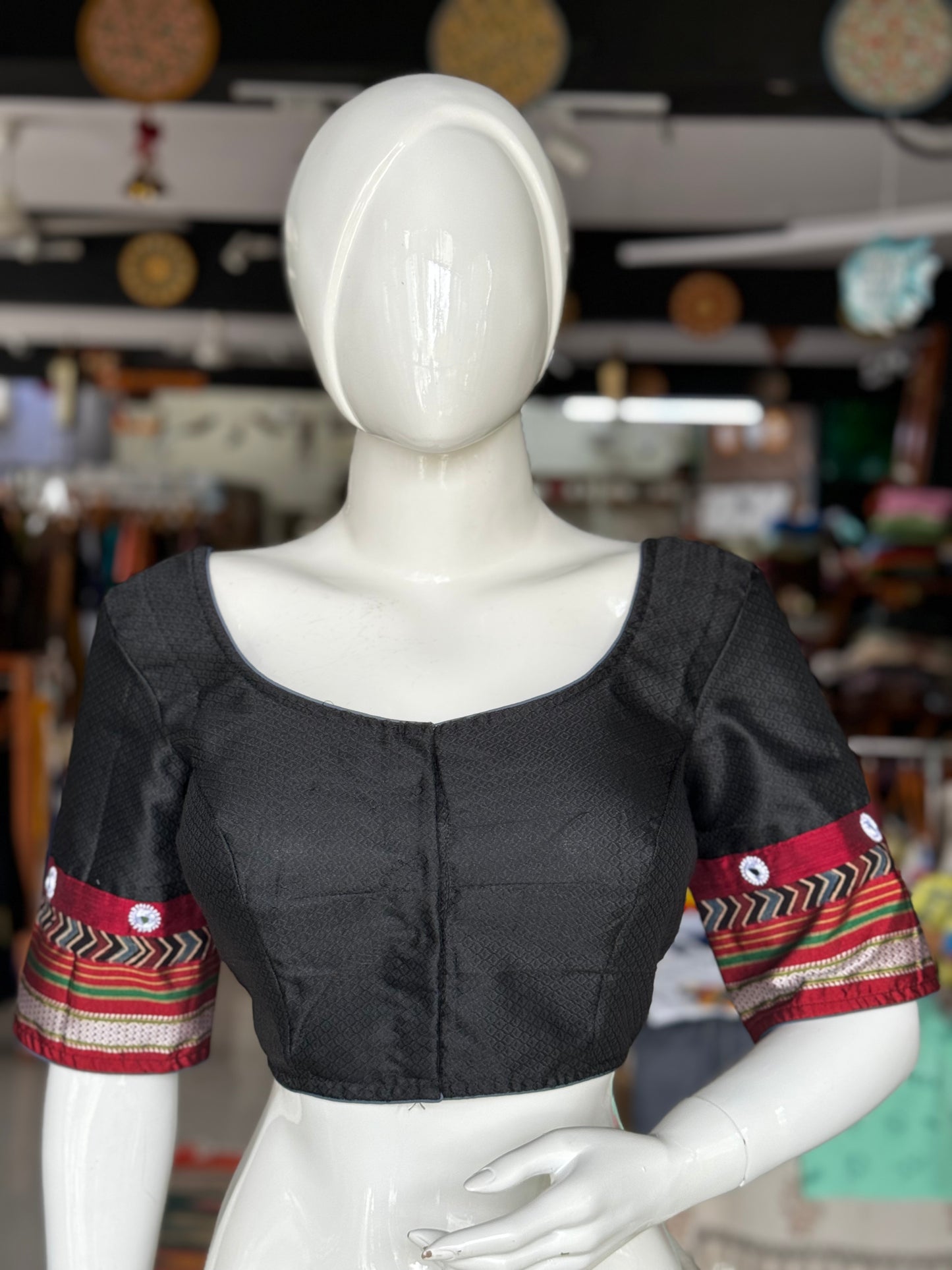 Black Khun blouse with mirror work and maroon border