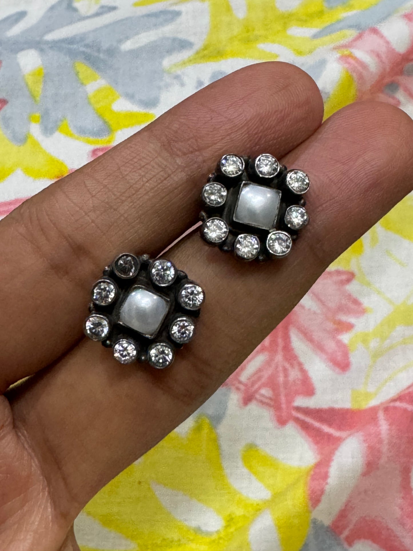 White stone rhombus studs in 92.5 sterling silver