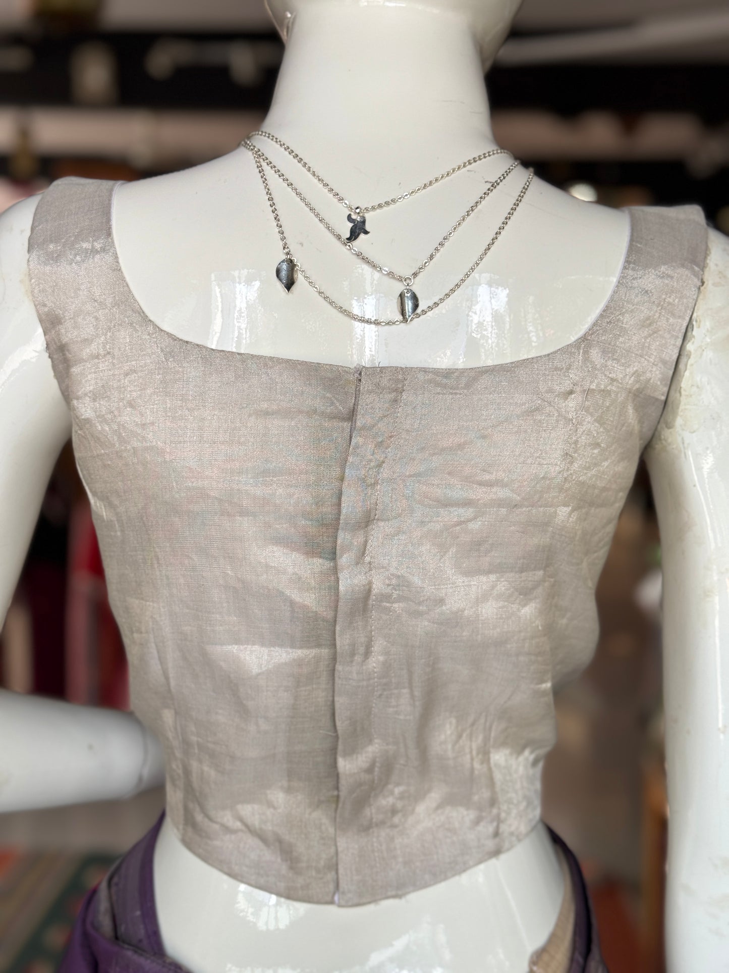 Silver tissue silk Chanderi handloom sleeveless blouse with wide neckline and waist curve