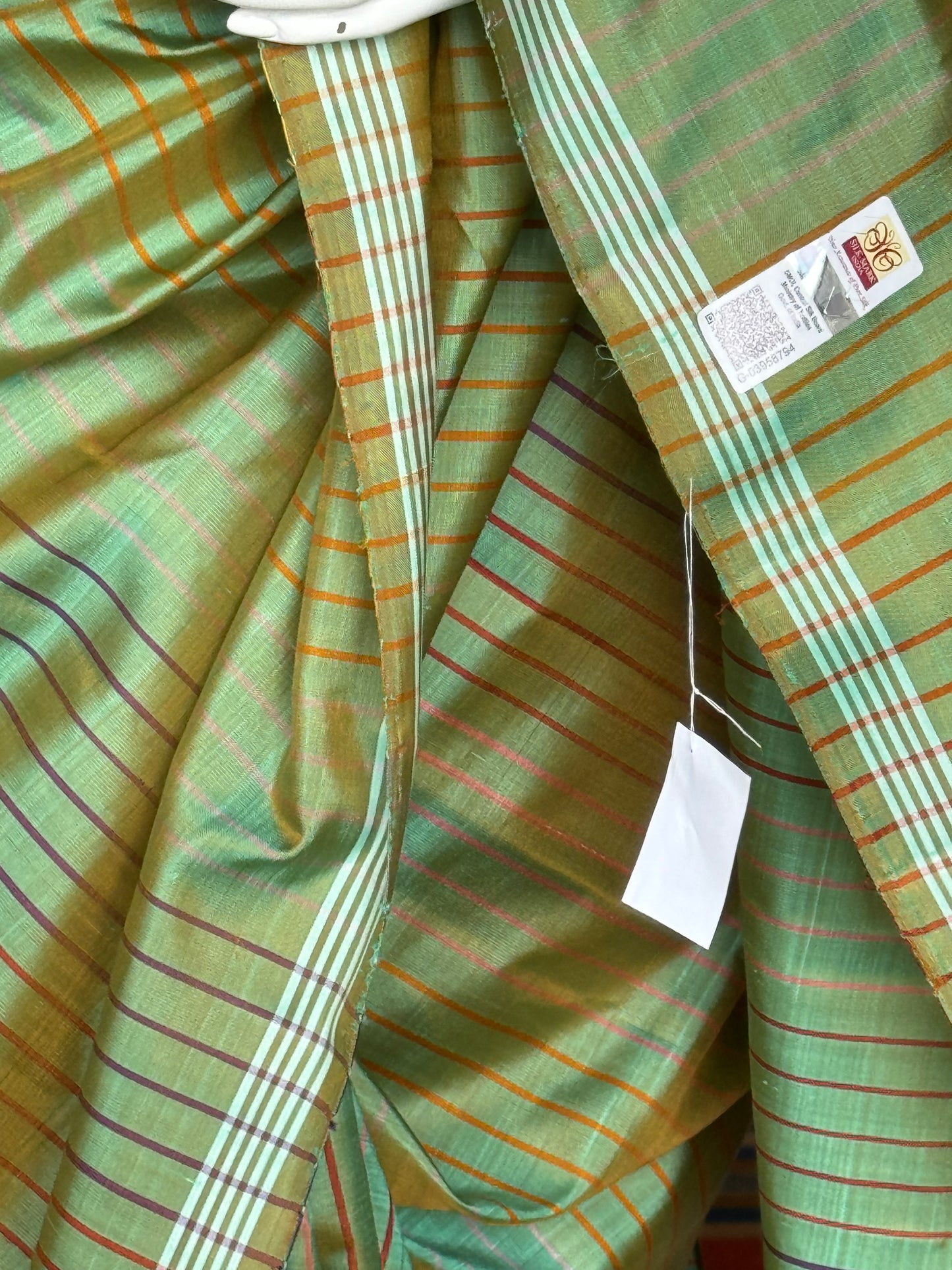 Green pure silk handloom kanjeevaram pattu saree with multi colored stripes all over