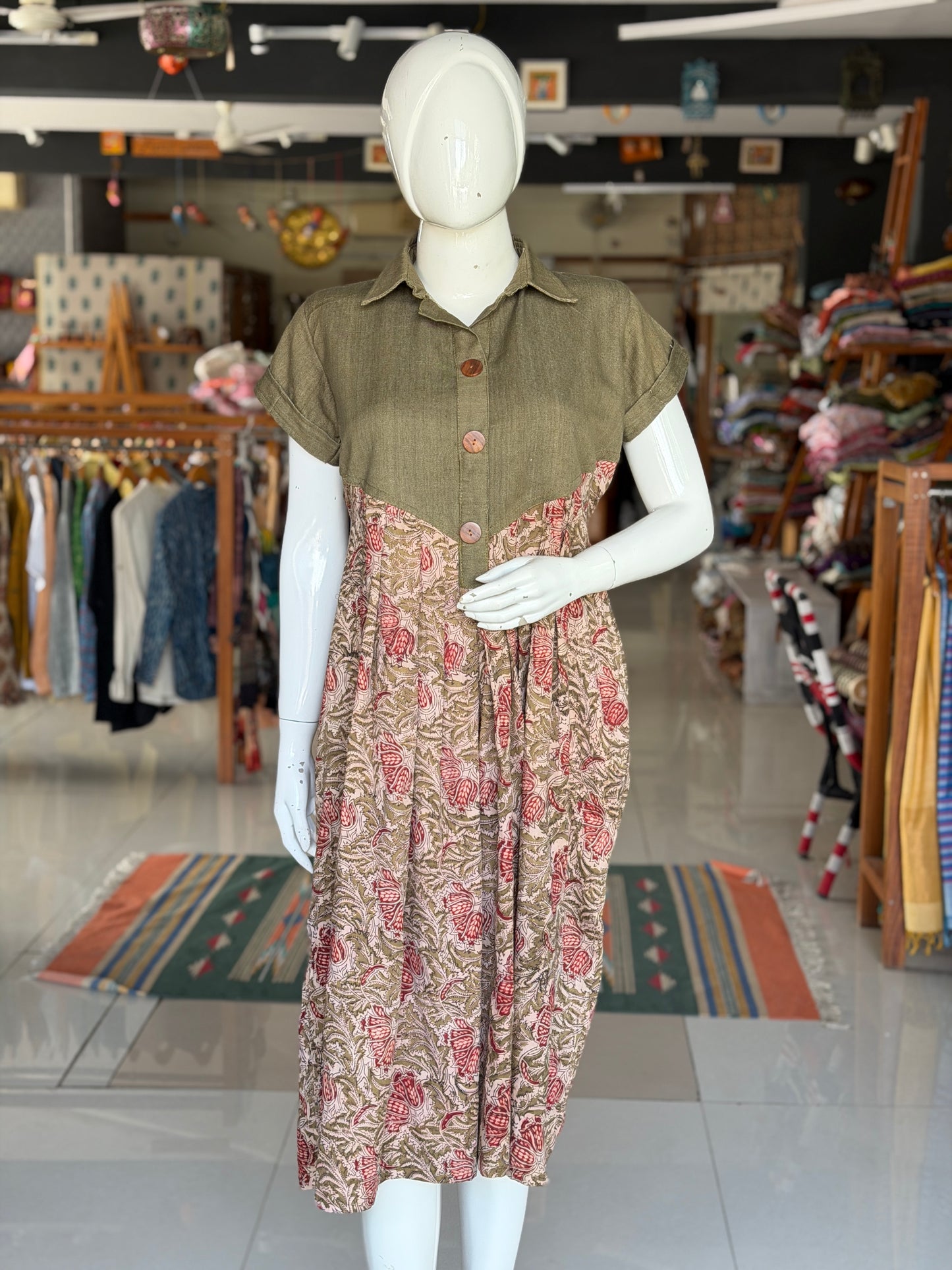 Green denim weave cotton hand woven playful shirt look dress with Kalamkari hand block printed attached skirt with pockets