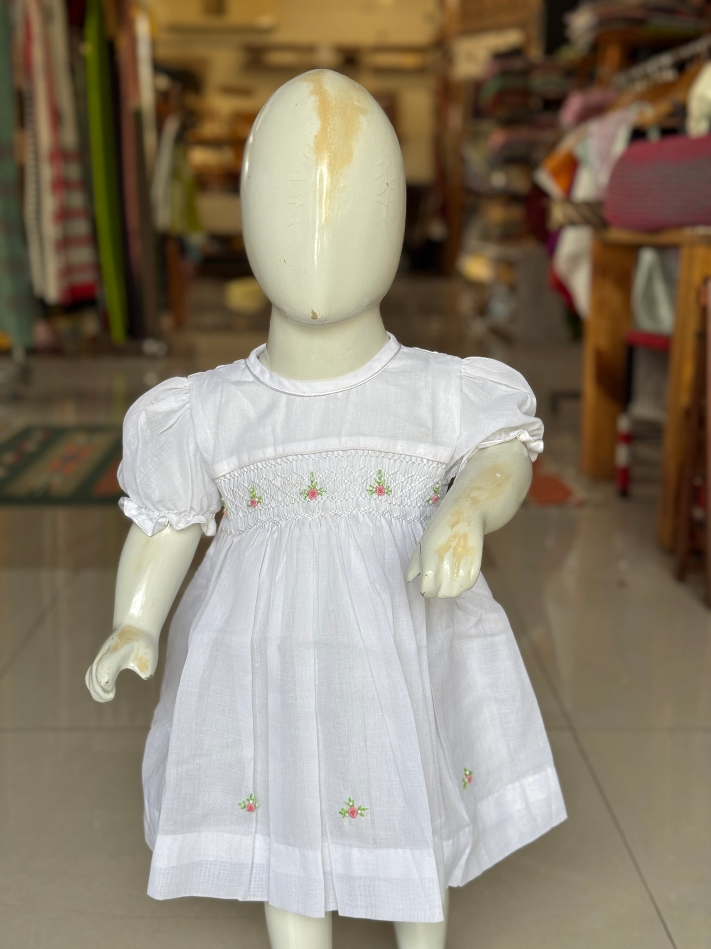 White hand embroidered smocking cotton frock for girls with piping for neck