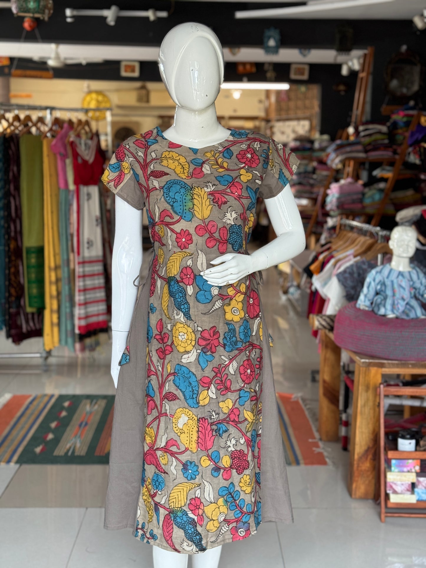 Brown floral pen Kalamkari hand painted cotton dress / kurti with plain side panels and side ties