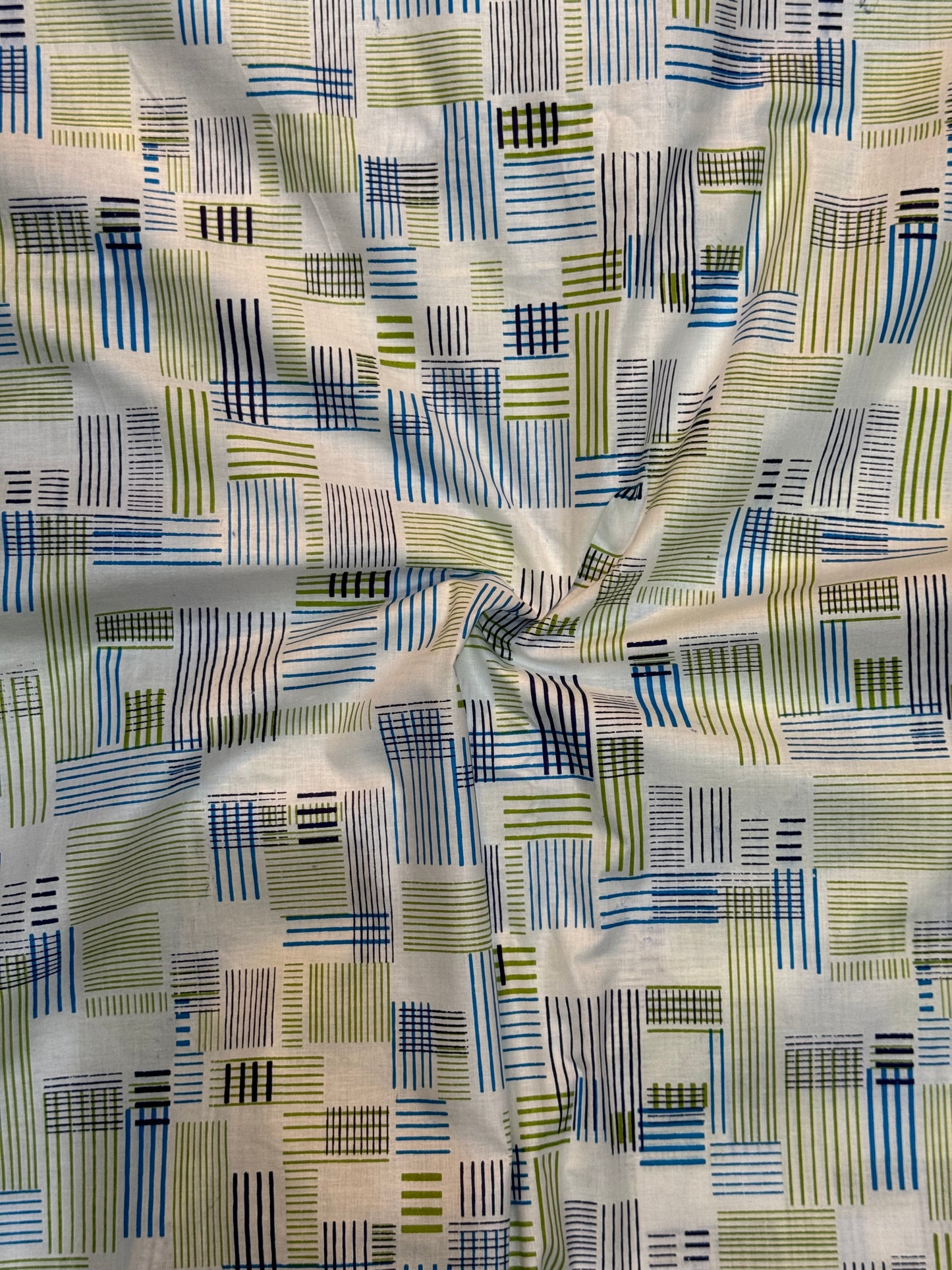 White hand block printed cotton fabric with blue green lines