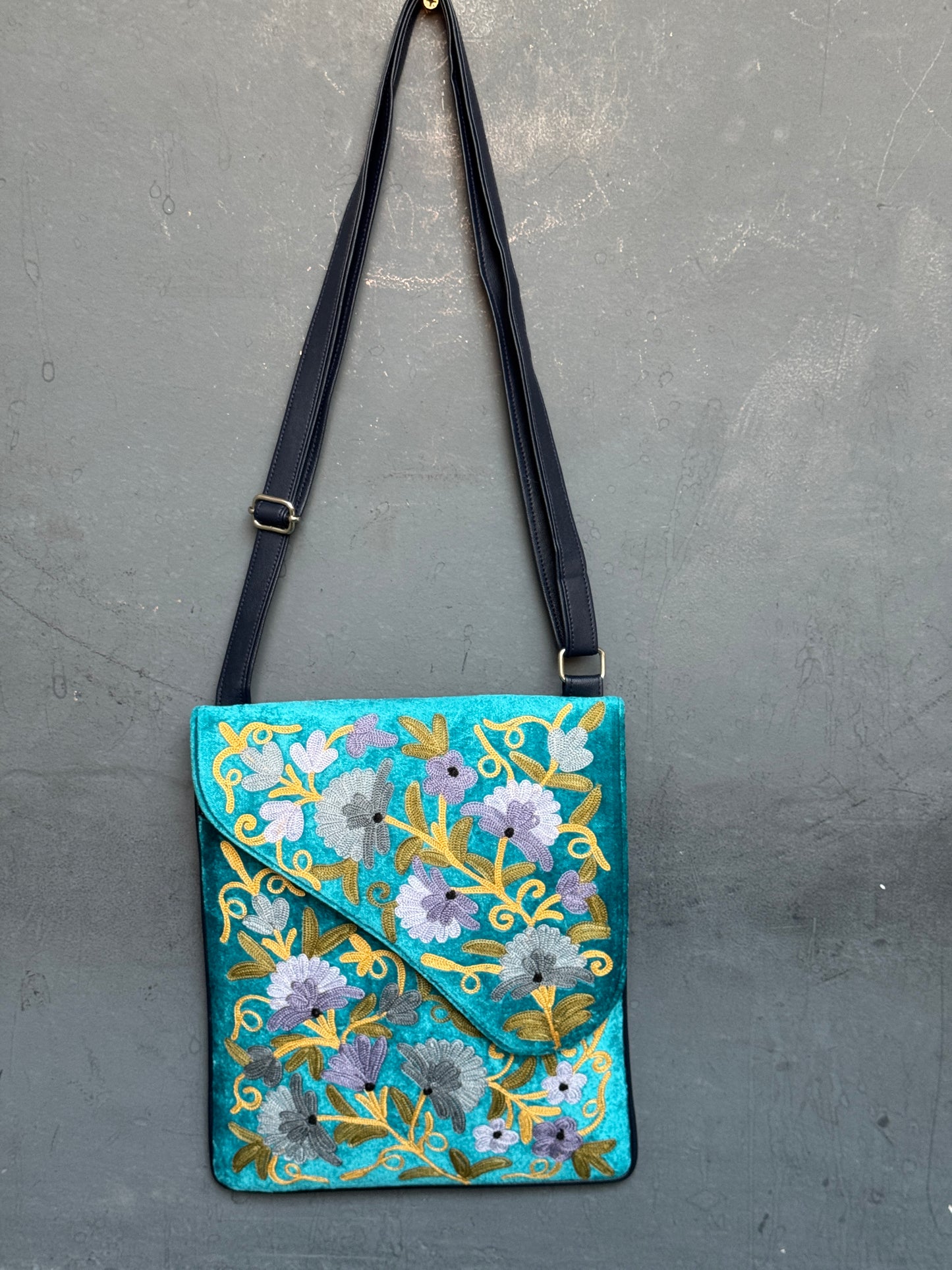 Blue Kashmiri floral Aari embroidered sling bag with adjustable length strap