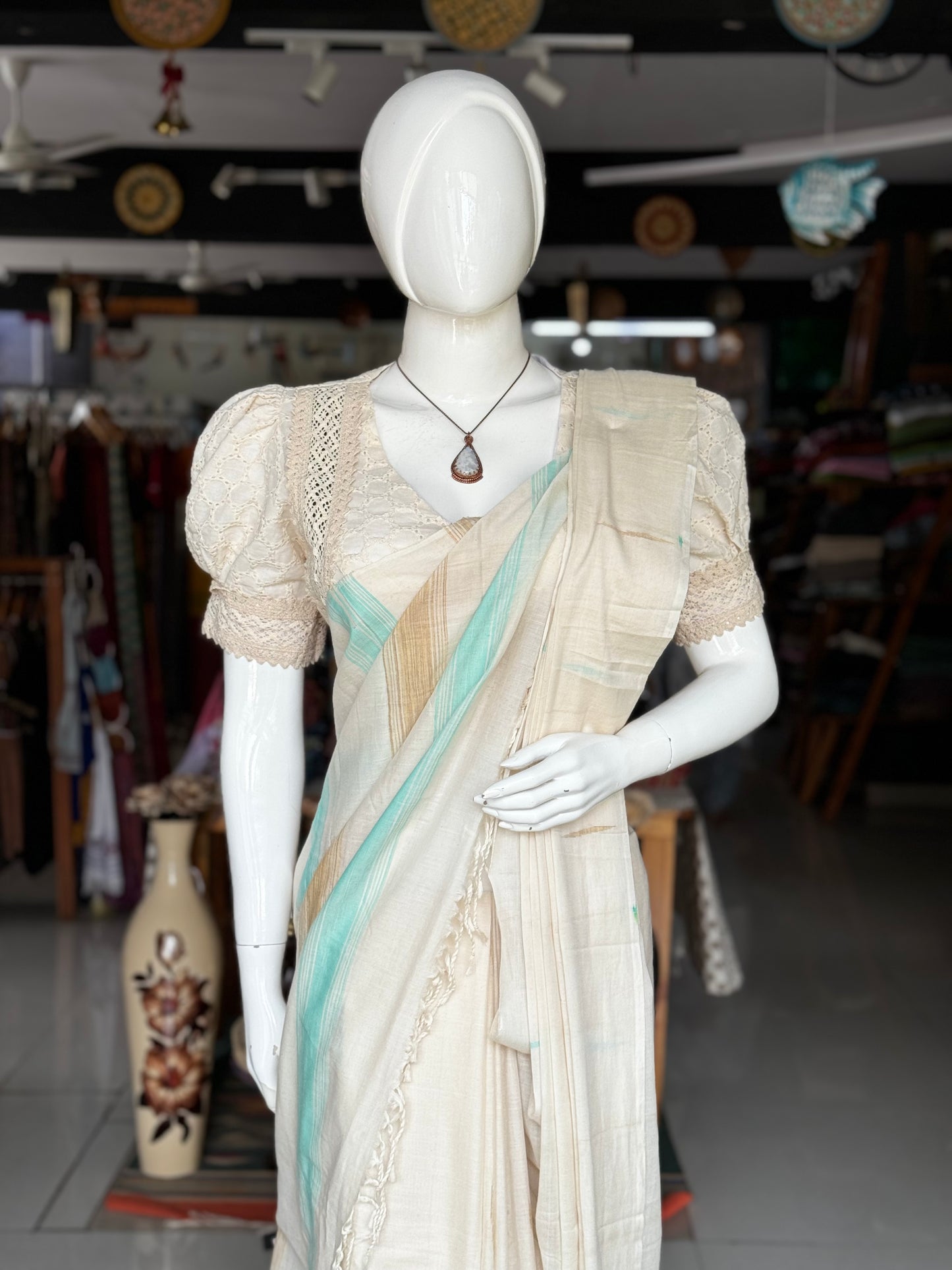 Offwhite pure soft cotton handloom saree with sea green and beige accents