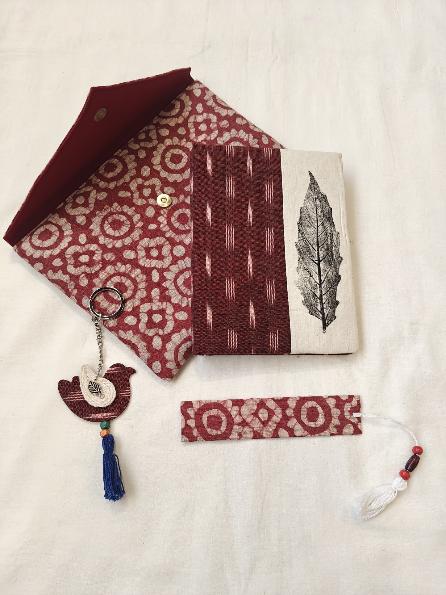 Handmade paper notebook with eco leaf printed fabric cover, hand crafted bookmark, key ring / charm and a container pouch set