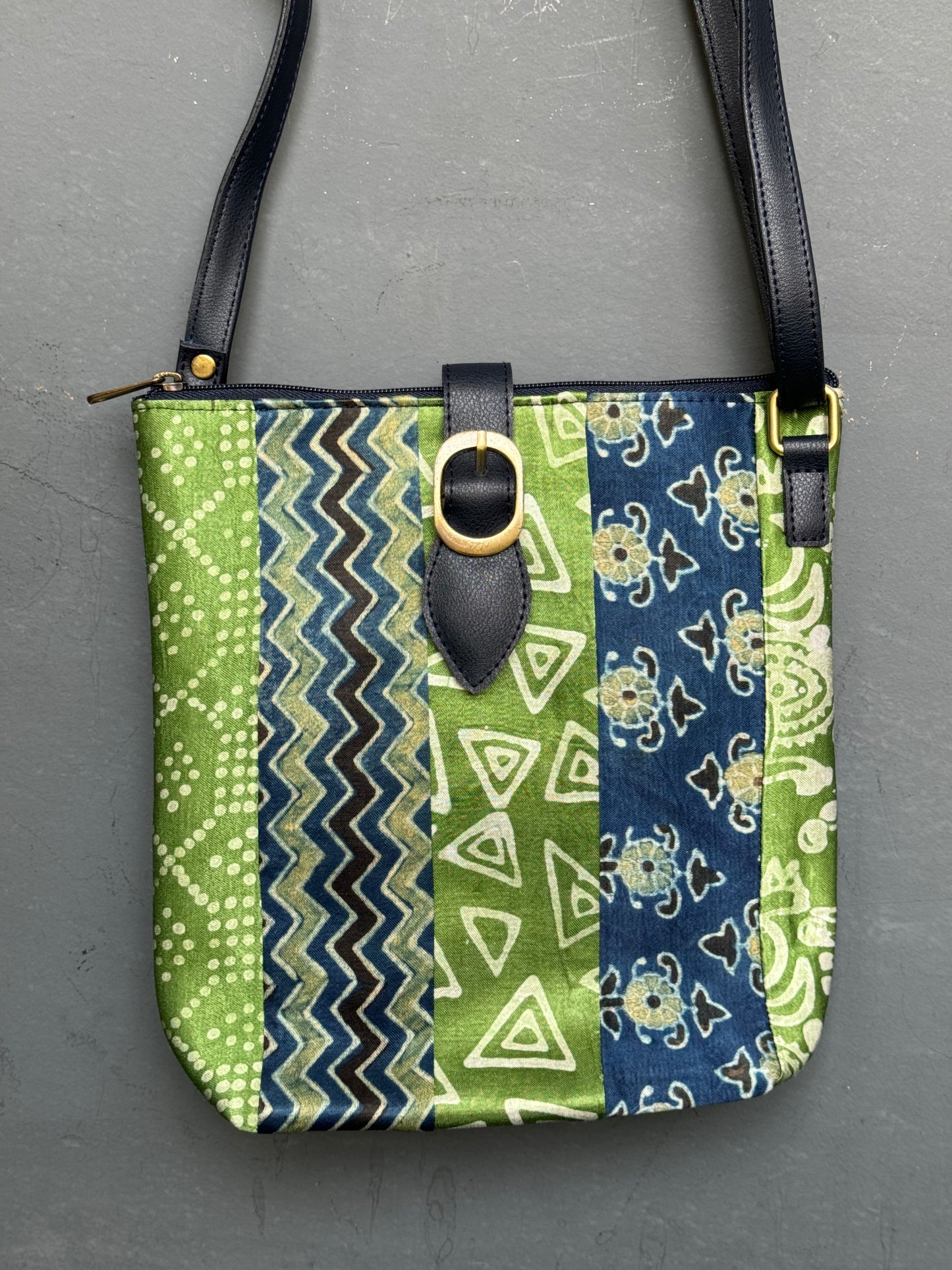 Multi colour patch work Mashru Ajrakh and Leather hand crafted sling bag