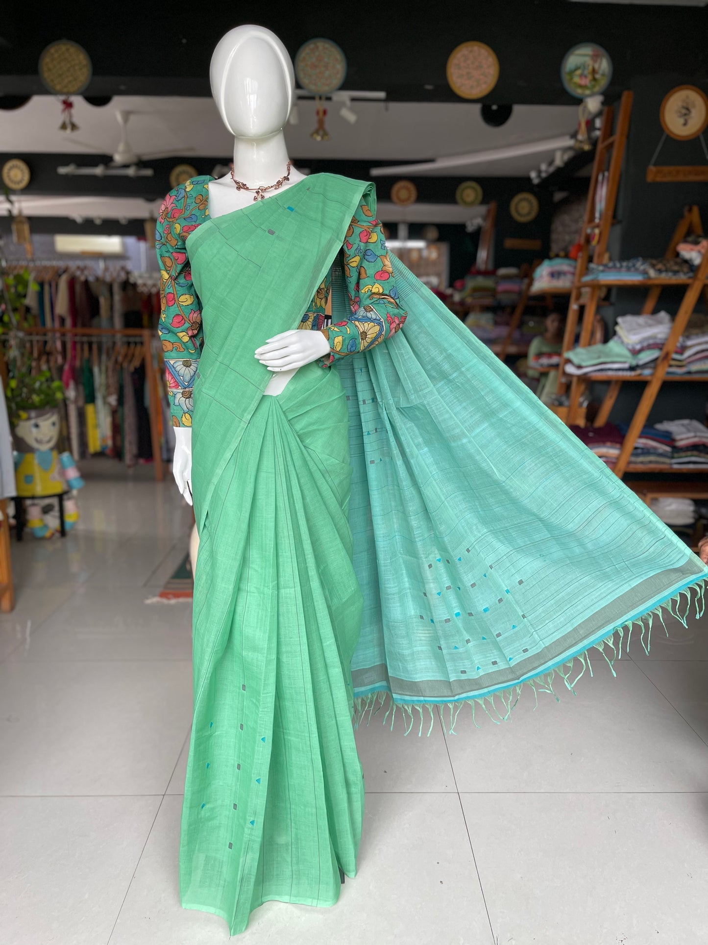 Serene Green and blue hand spun hand woven cotton saree with geometric butis