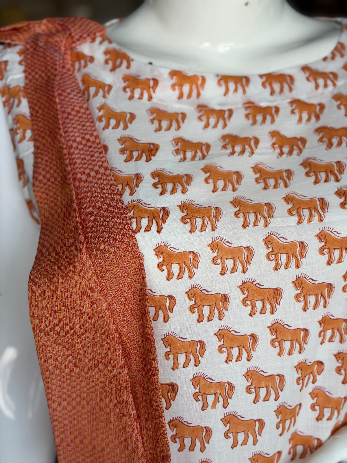 White n Orange cotton dress with horses hand block prints and handwoven 4 pedal weave trims