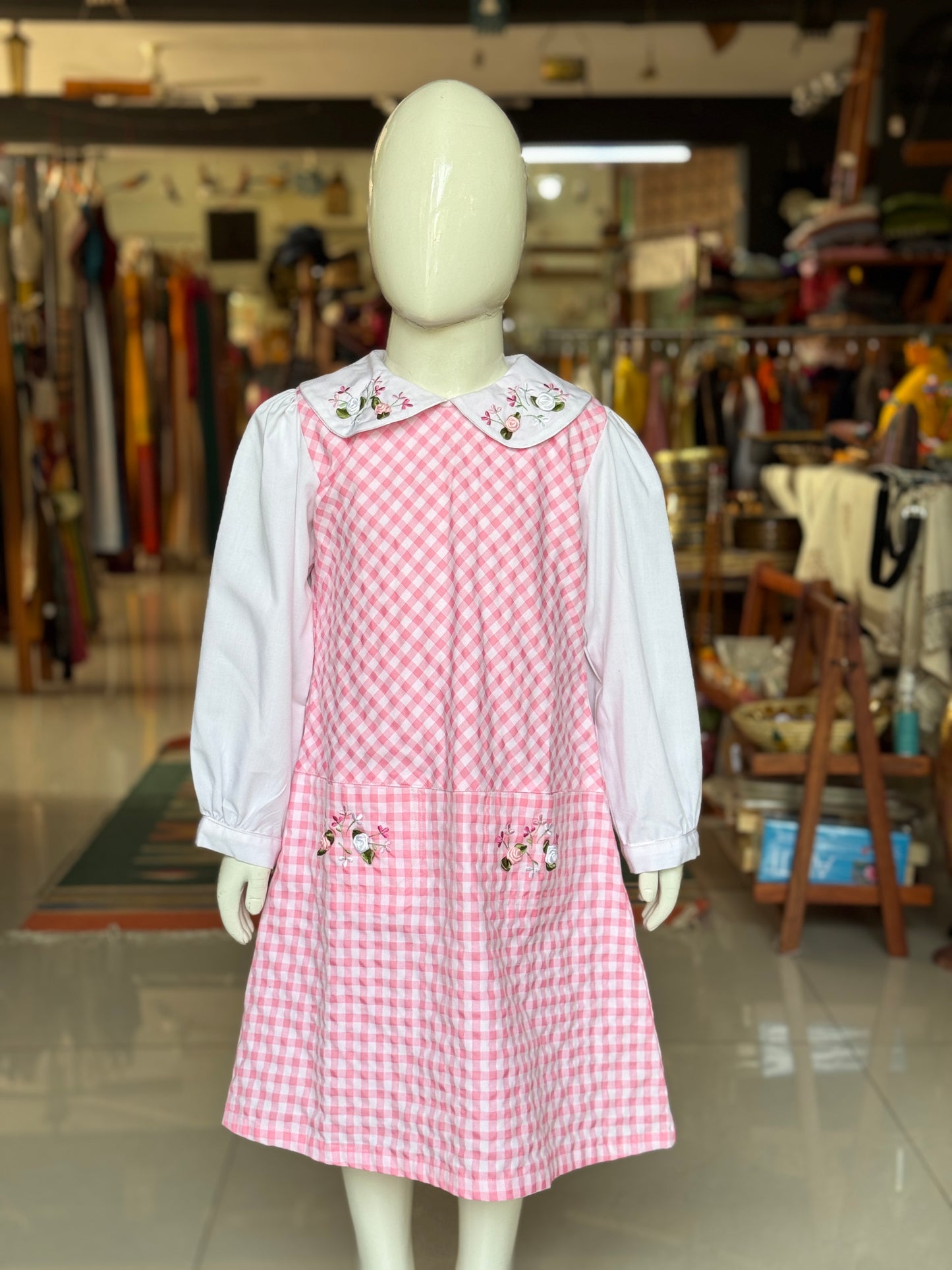 Pink and white checks frock with embroidered collar and long sleeves