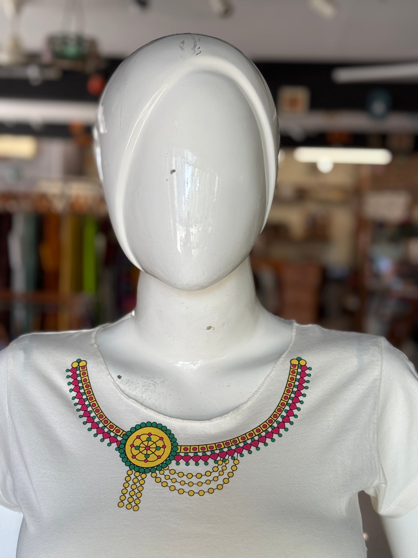 Off white women’s tee - cotton, with quirky necklace print along the neckline