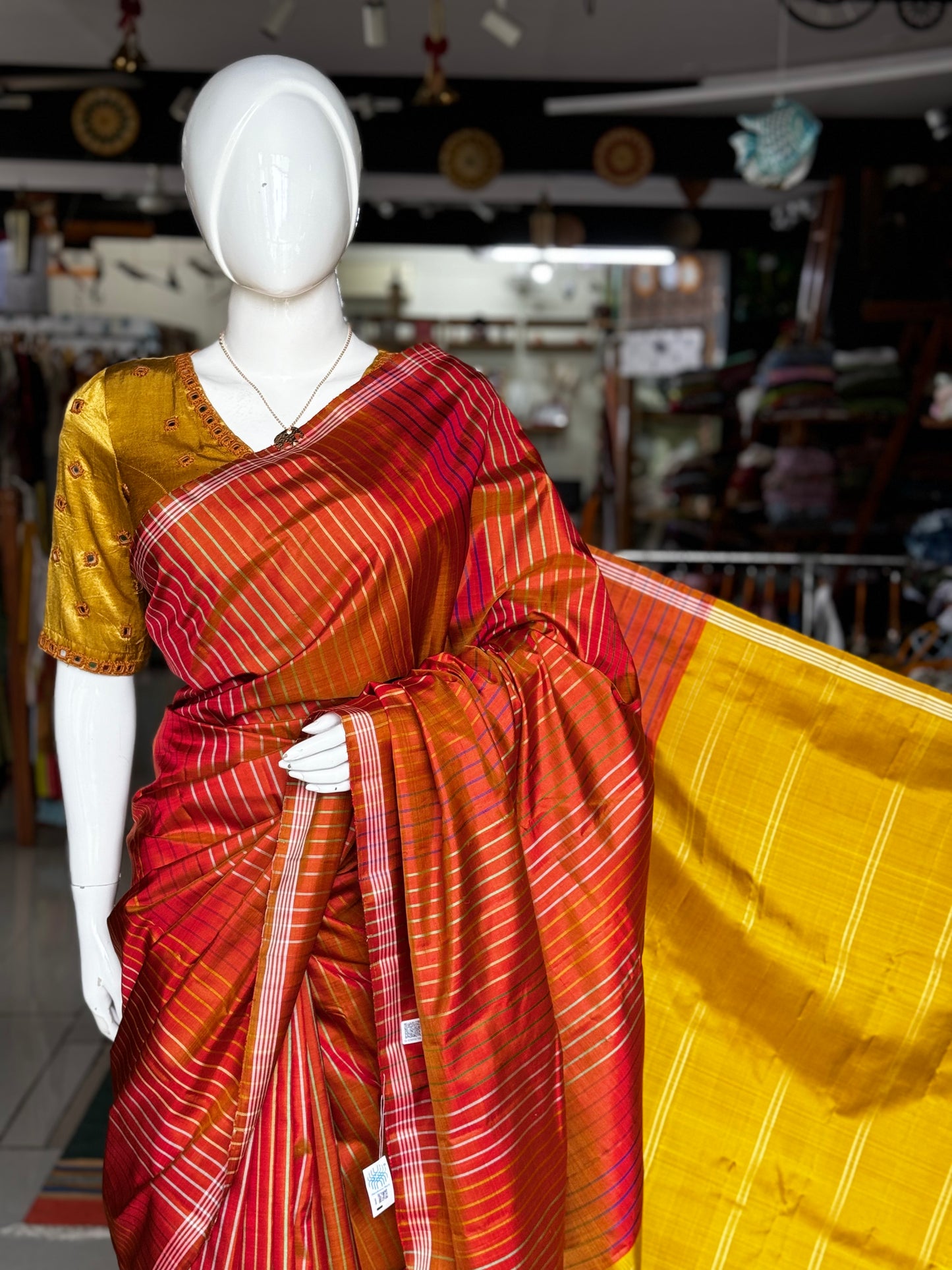 Orange pure silk handloom kanjeevaram pattu saree with multi colored stripes all over