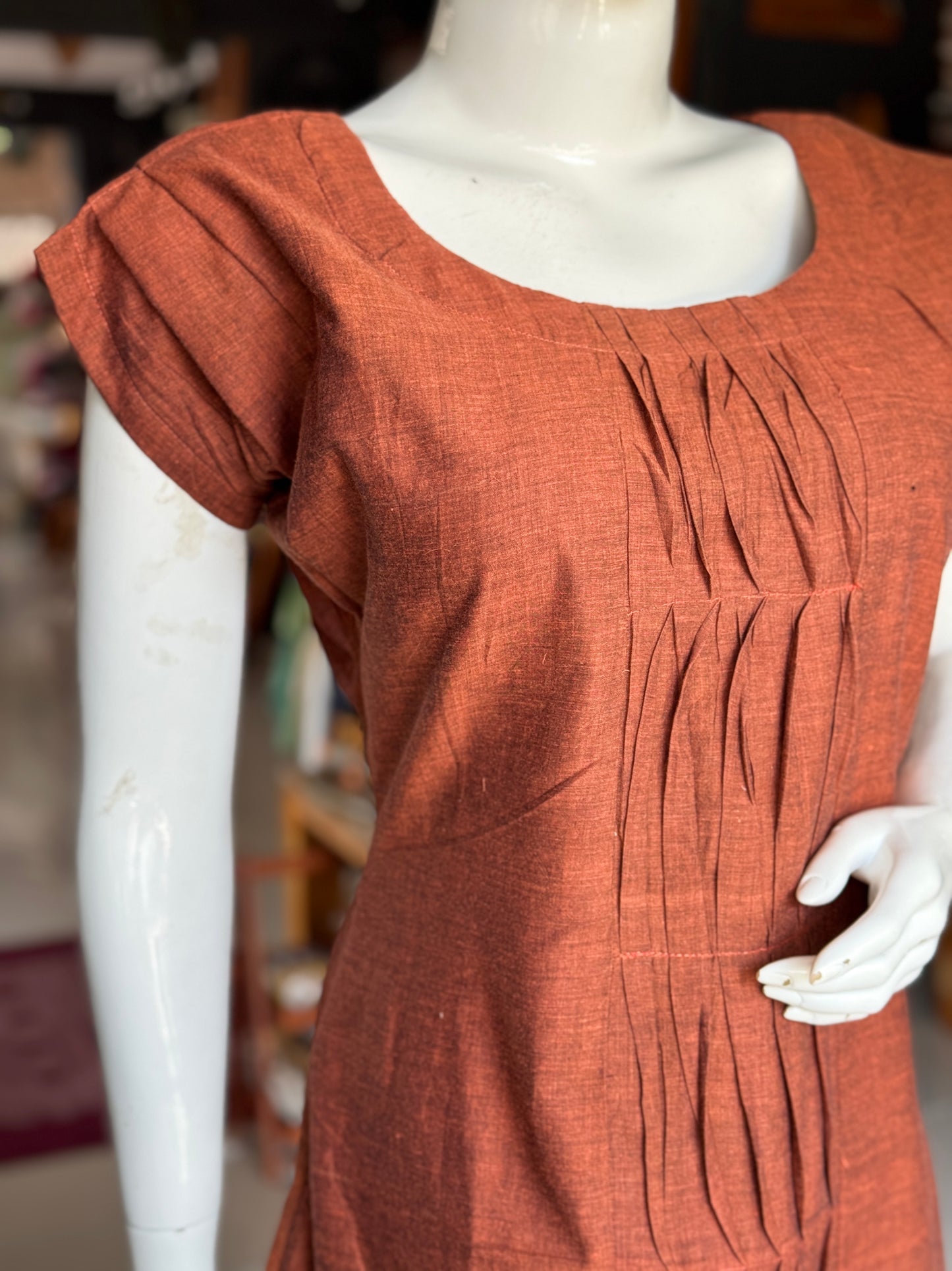 Brown handwoven soft mul cotton dress with twisted pintucks center panel and pleated shoulder sleeves