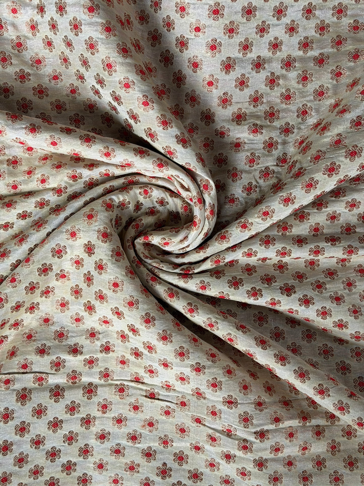 Cream handwoven silk fabric with gold and red flower butis