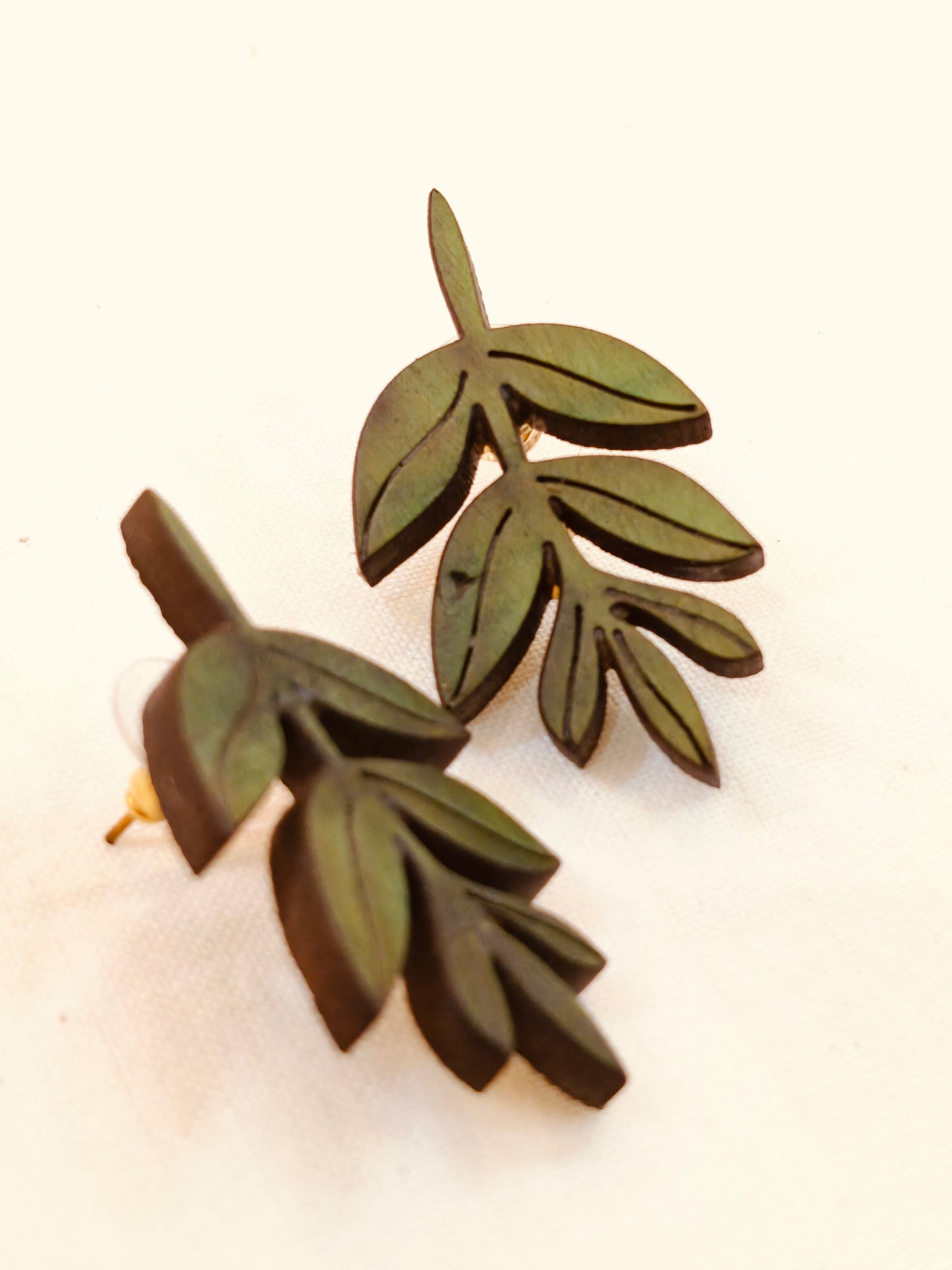 Leaf design earrings in wood