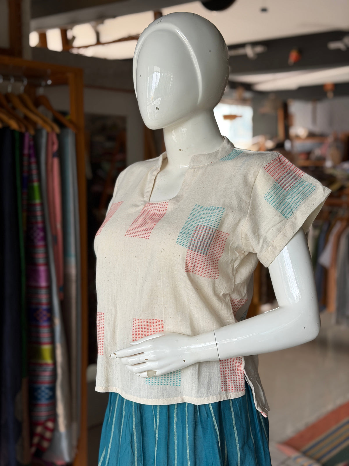 Off white hand woven cotton top with orange and teal woven squares