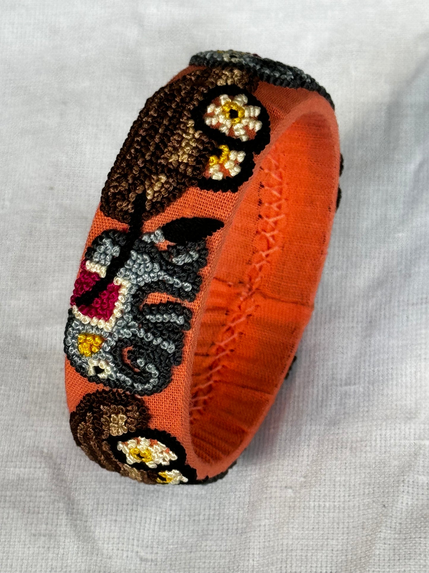 Orange french knot elephants hand embroidered bangle - single