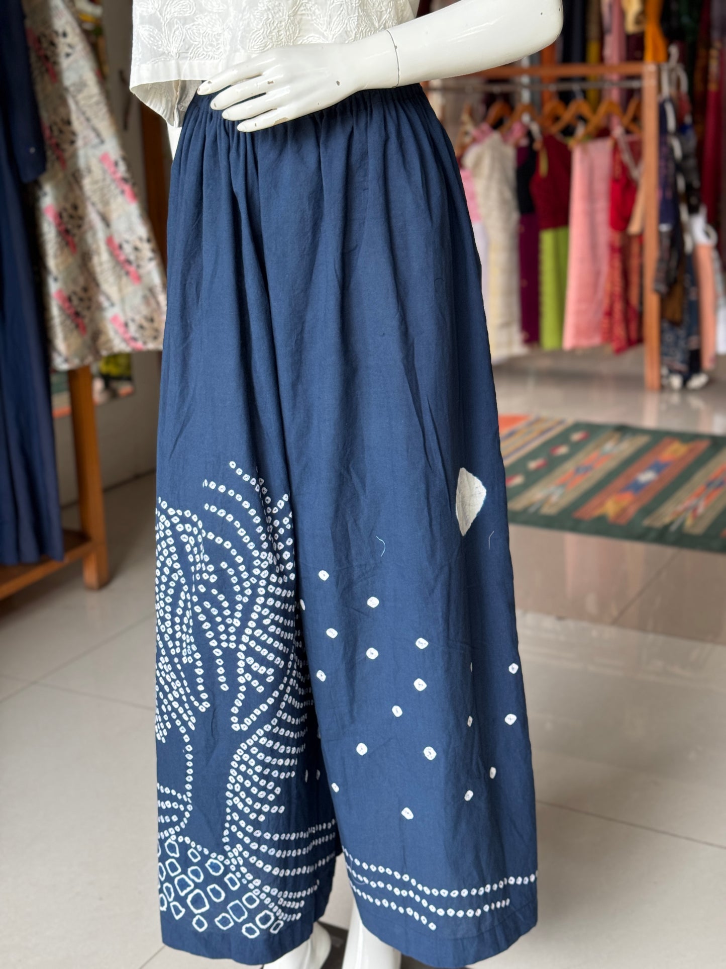 Placement bandini cotton blue flared pants with hand tie n dye tree design - free size