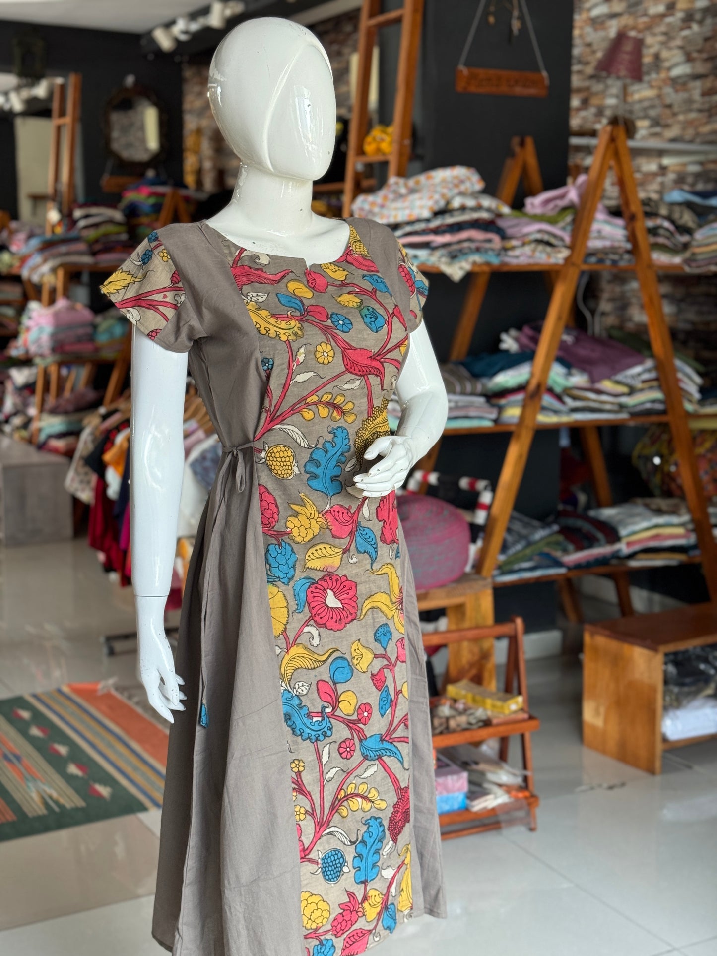 Brown floral pen Kalamkari hand painted cotton dress / kurti with plain side panels and side ties