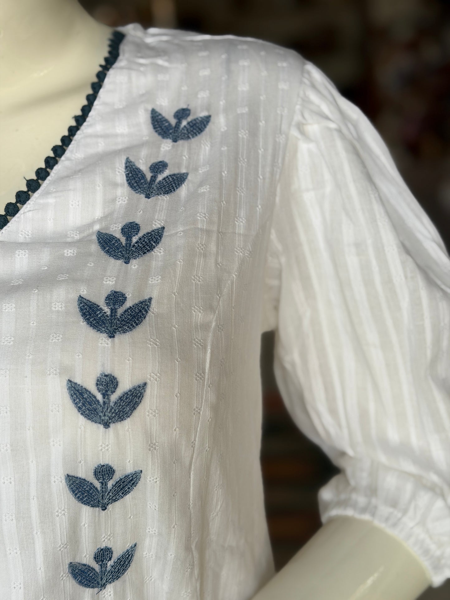 White and blue embroidered cotton dress with self stripes