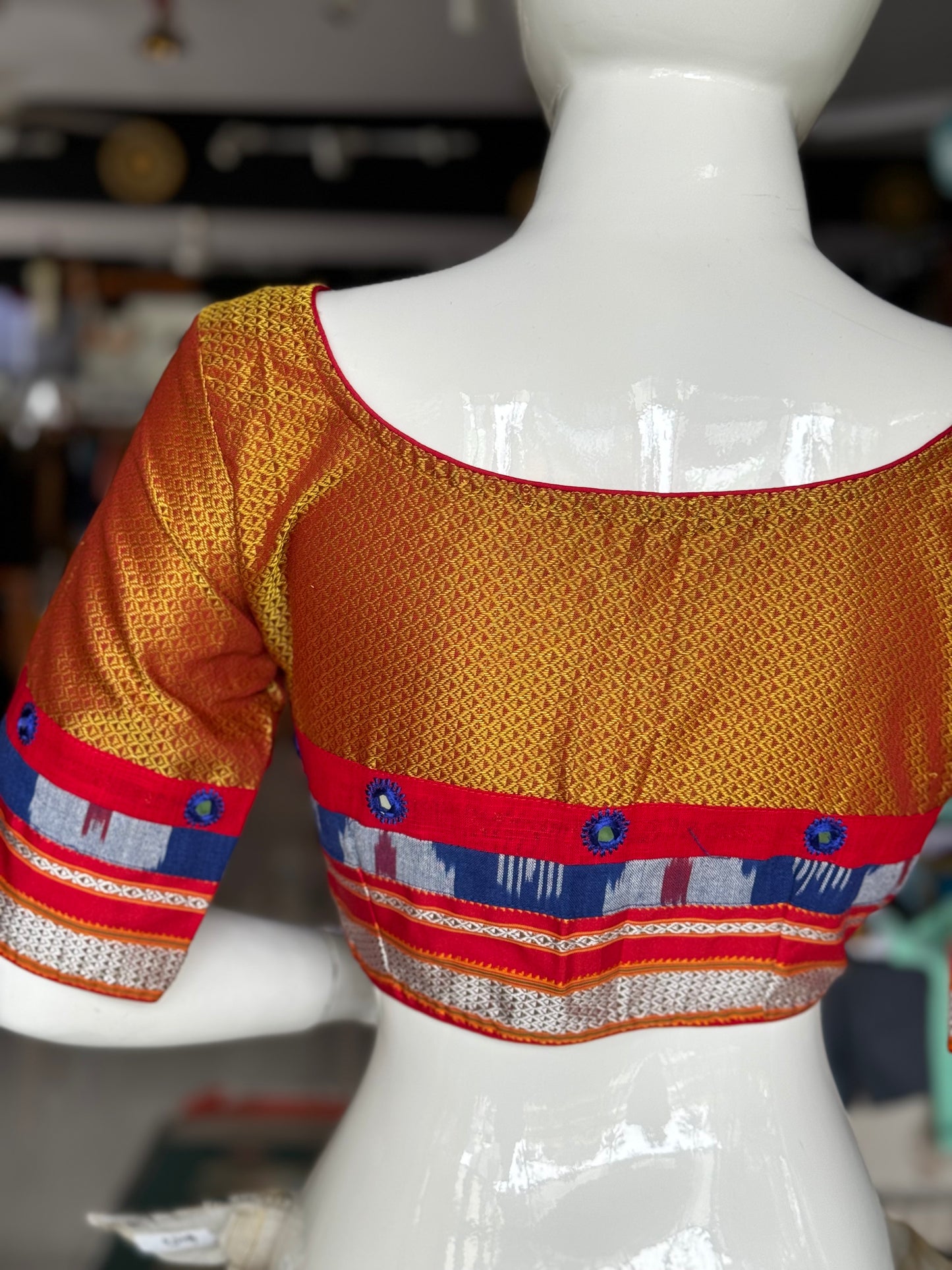 Orange Khun blouse with mirror work